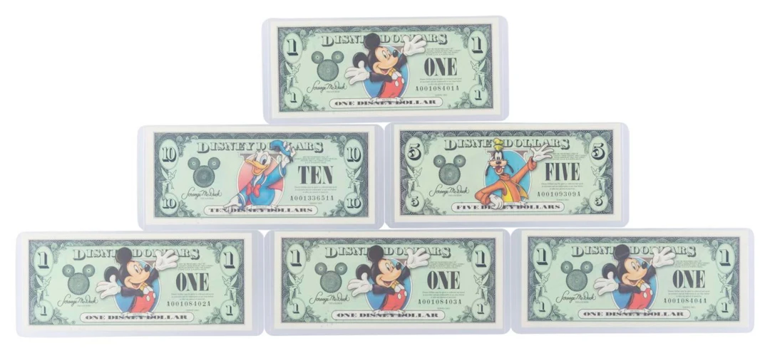 The Disneyland 2003 AA Series $1, $5, and $10 Bills.