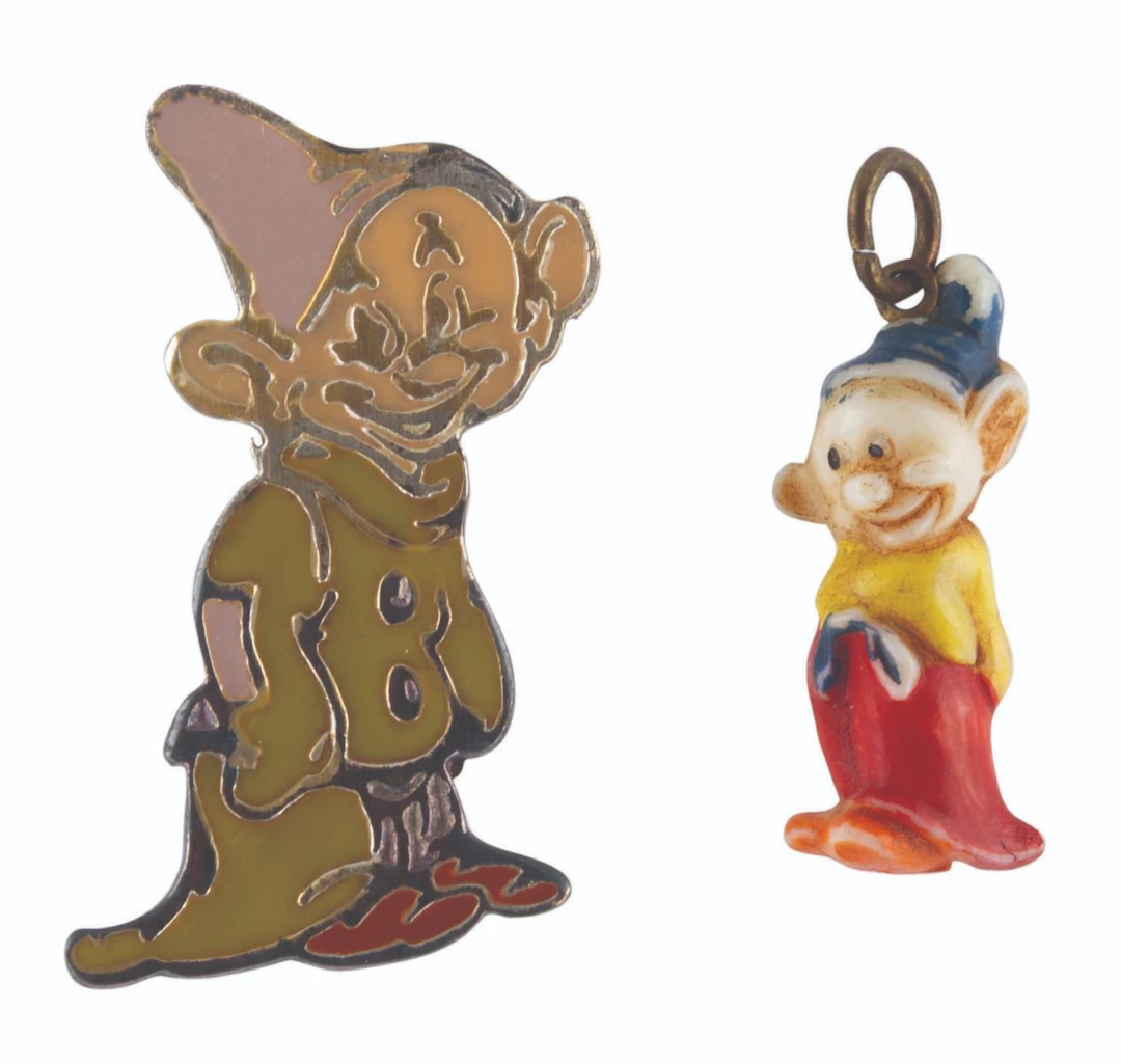 An Early Dopey Pin and Charm.