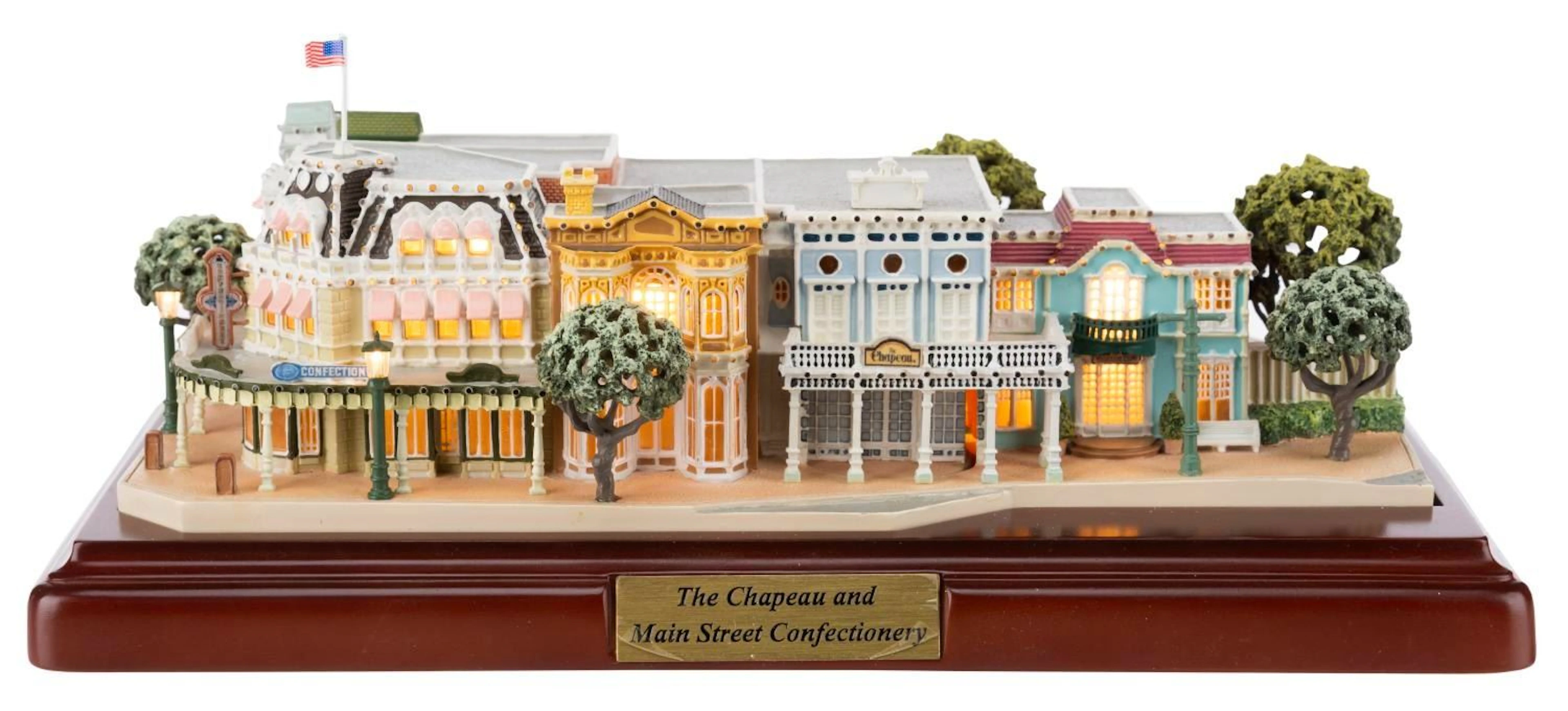 A First Edition Olszewski Disney World Chapeau and Main Street Confectionery.