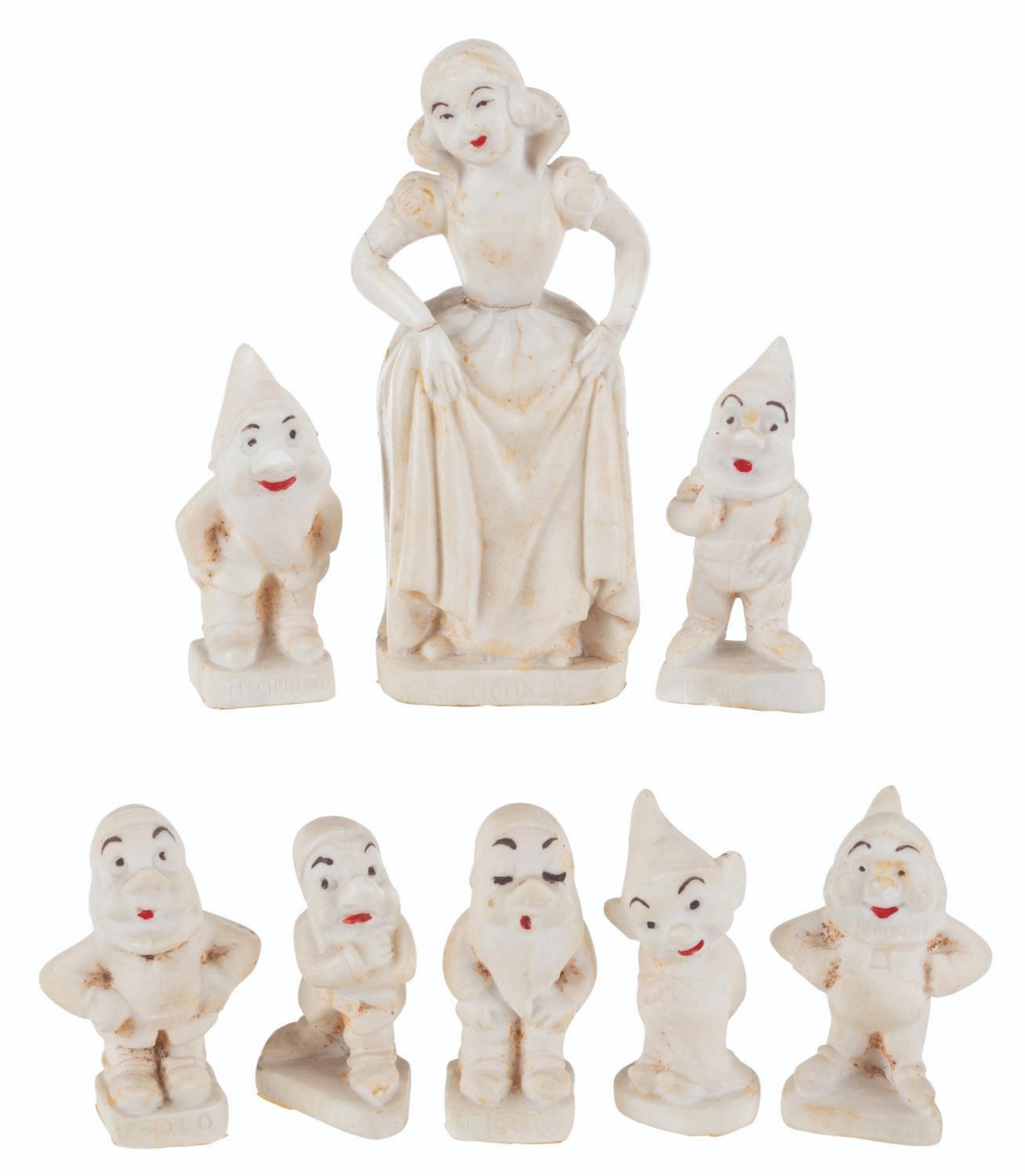 An Italian "Snow White and the Seven Dwarfs" Figure Set.