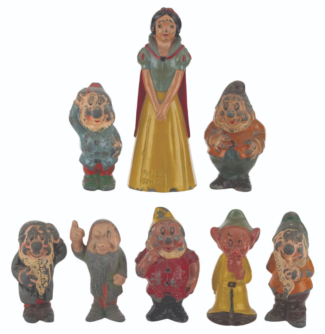A "Snow White and the Seven Dwarfs" Die-Cast Figurine Set.
