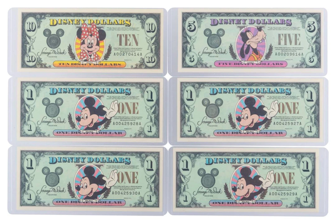 The Disneyland 1995 AA Series $1, $5, and $10 Bills.