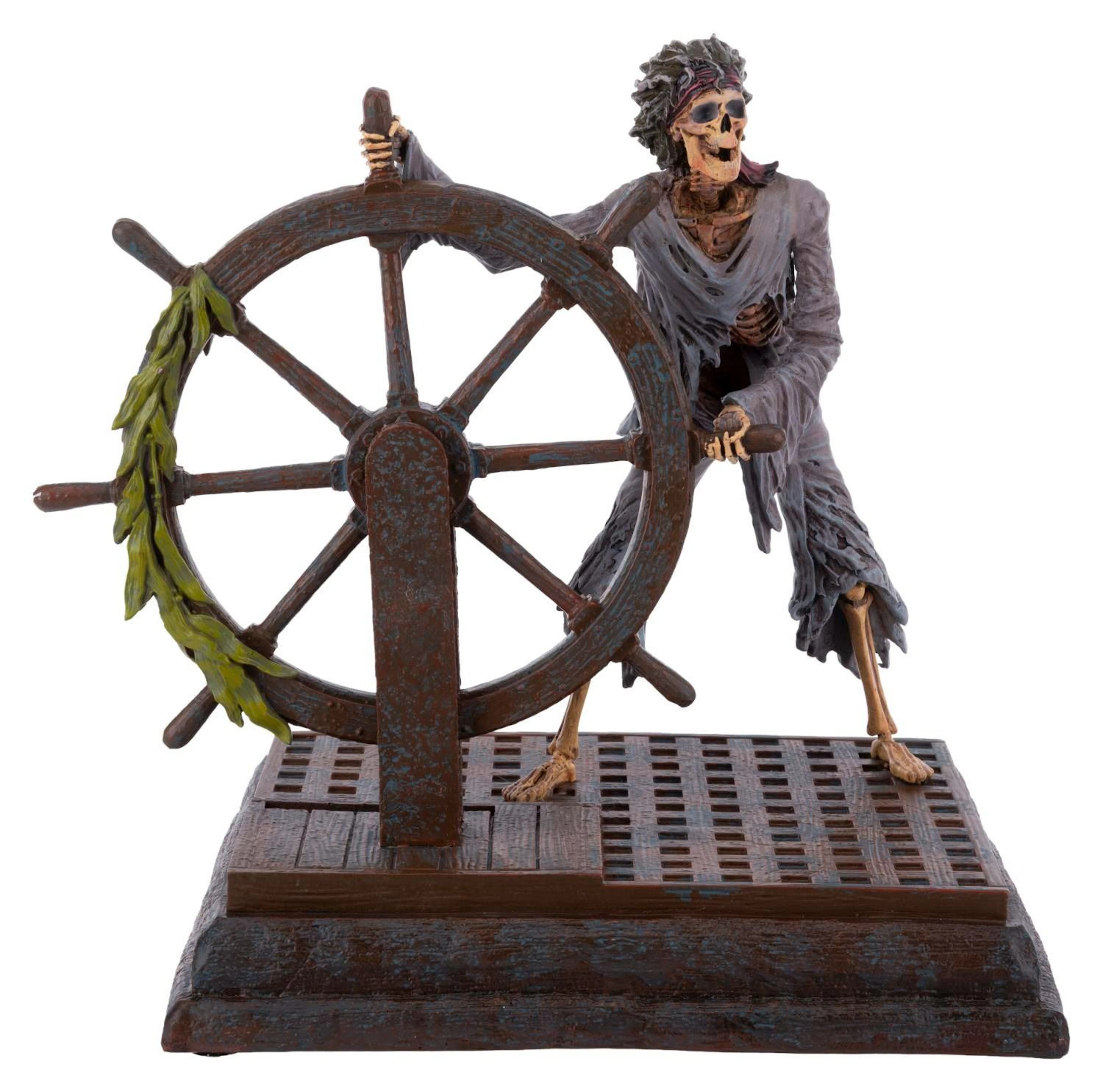 A Pirates of the Caribbean Helmsman Figurine.