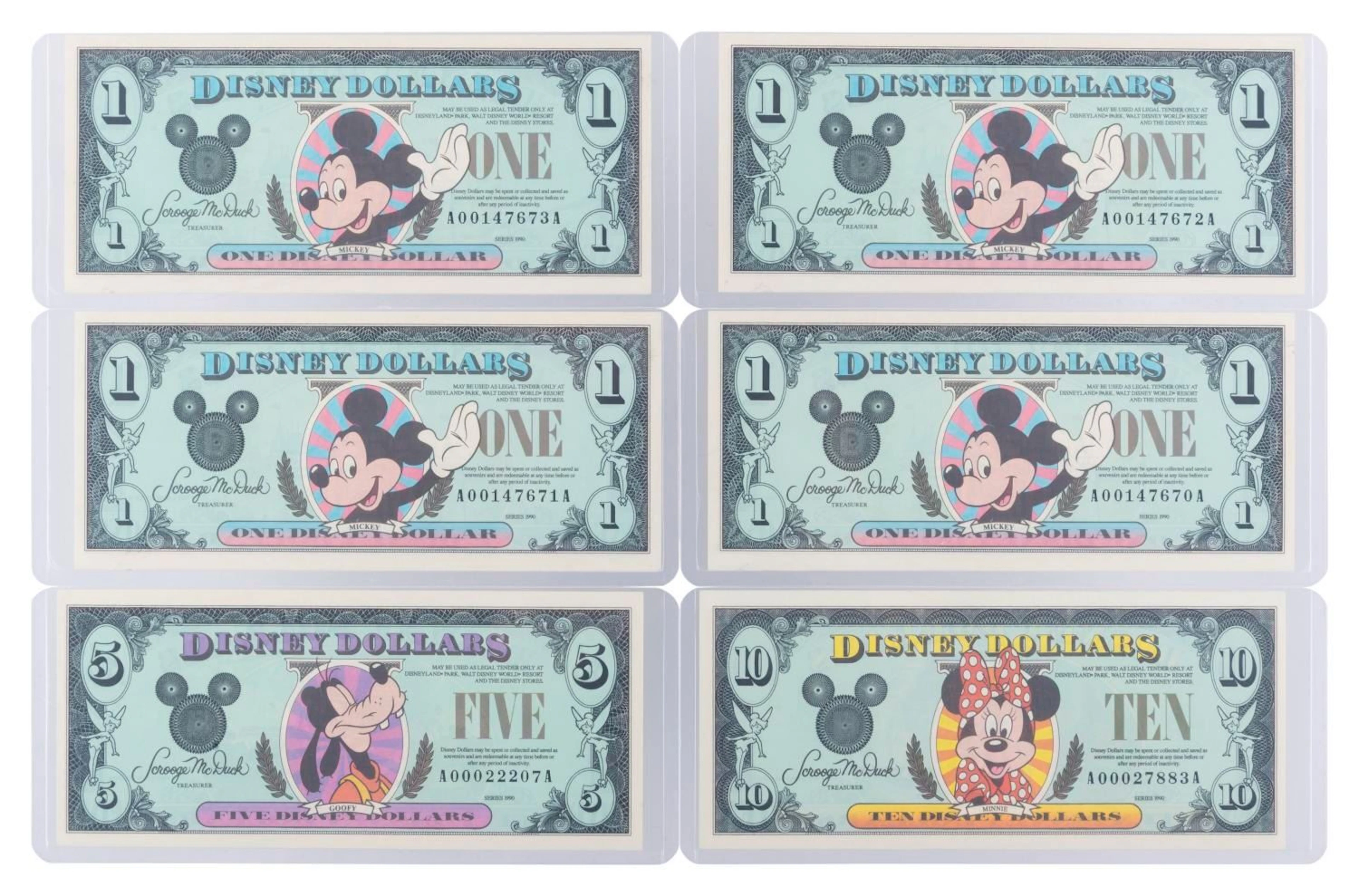 The Disneyland 1990 AA Series $1, $5, and $10 Bills.