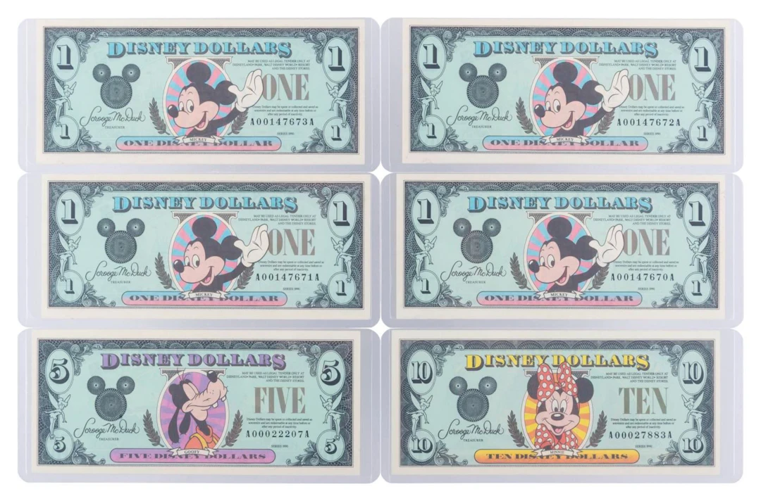 The Disneyland 1990 AA Series $1, $5, and $10 Bills.