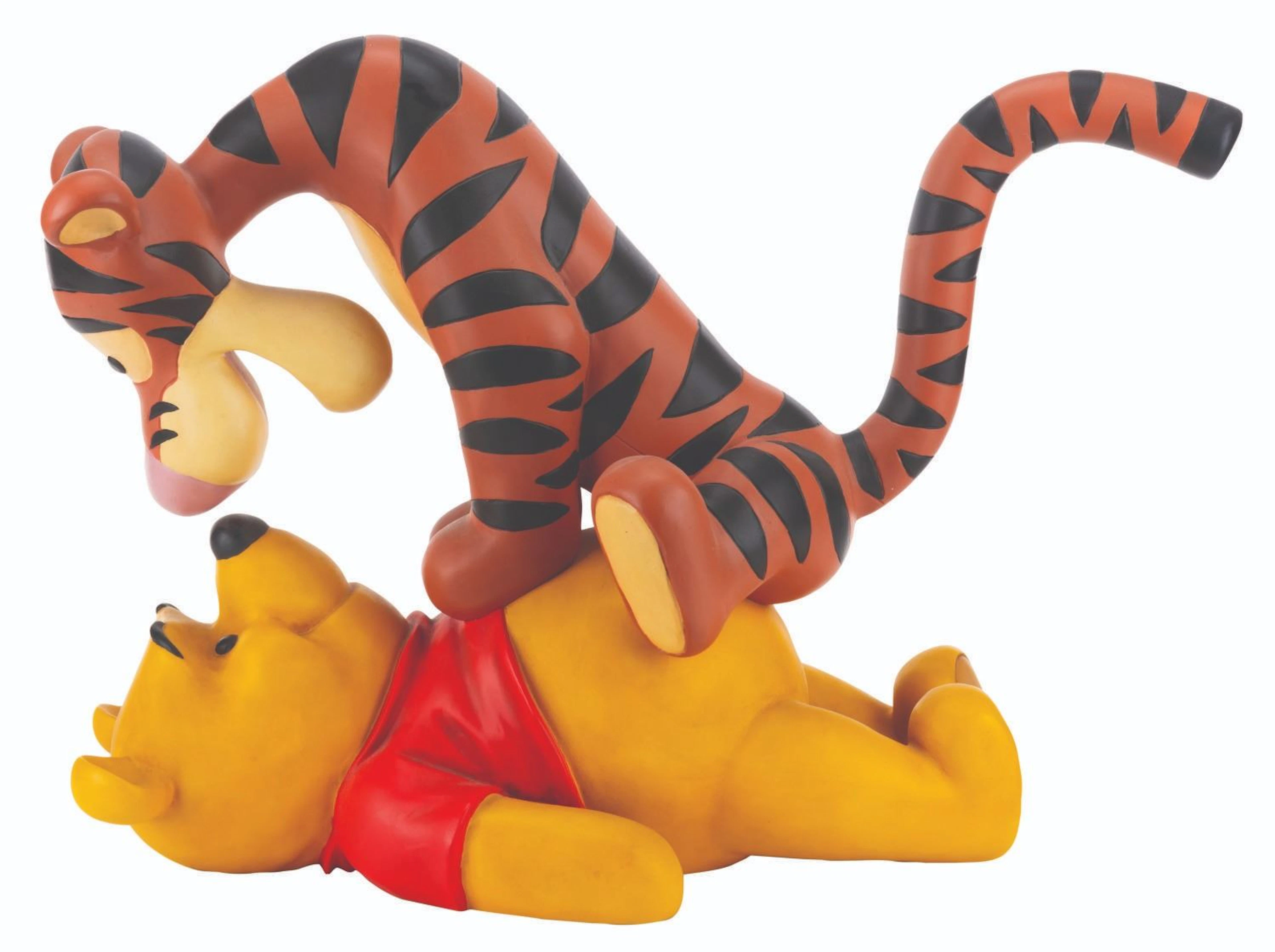 A Winnie the Pooh and Tigger Figurine.