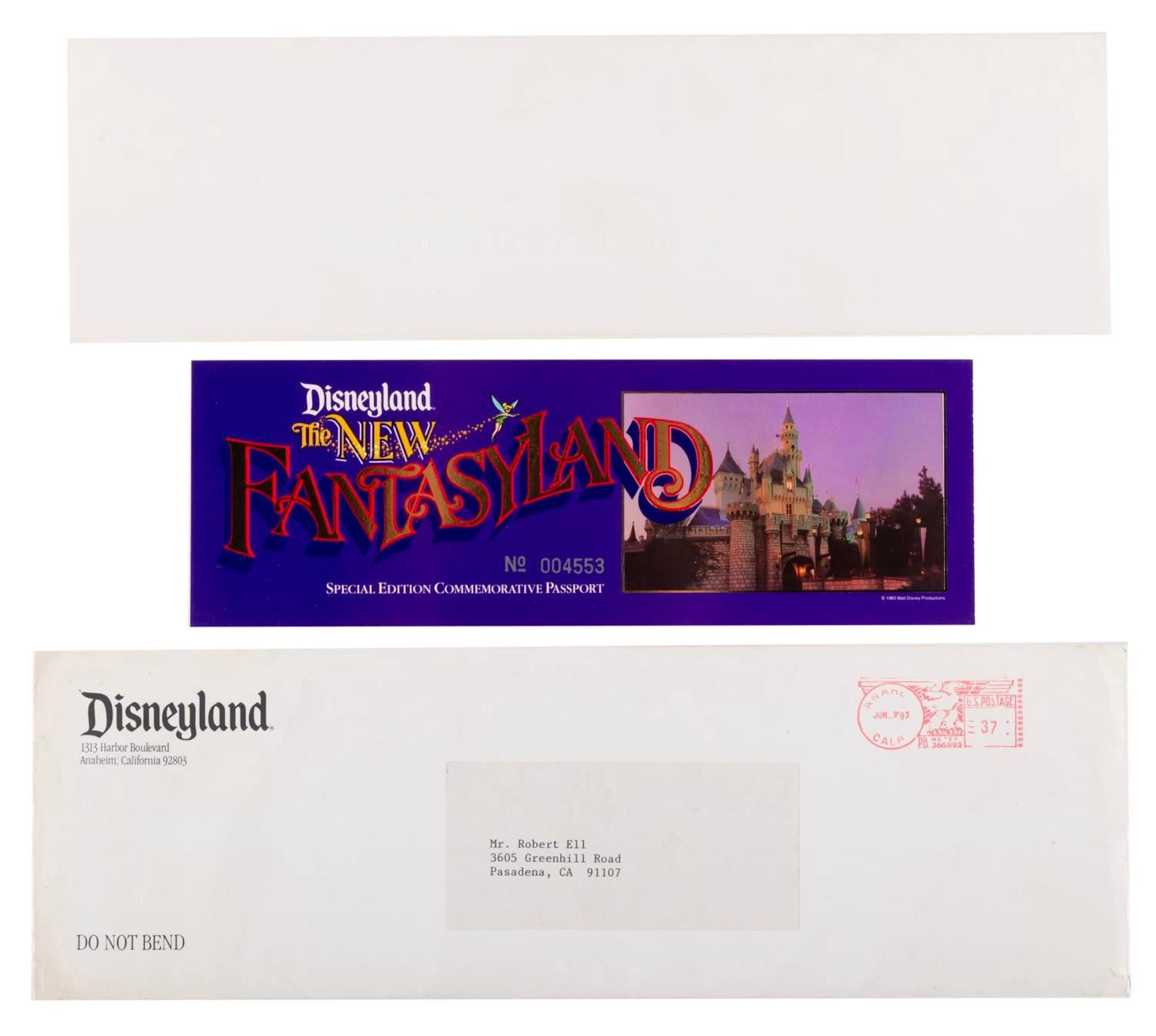 A Disneyland New Fantasyland Commemorative Passport.