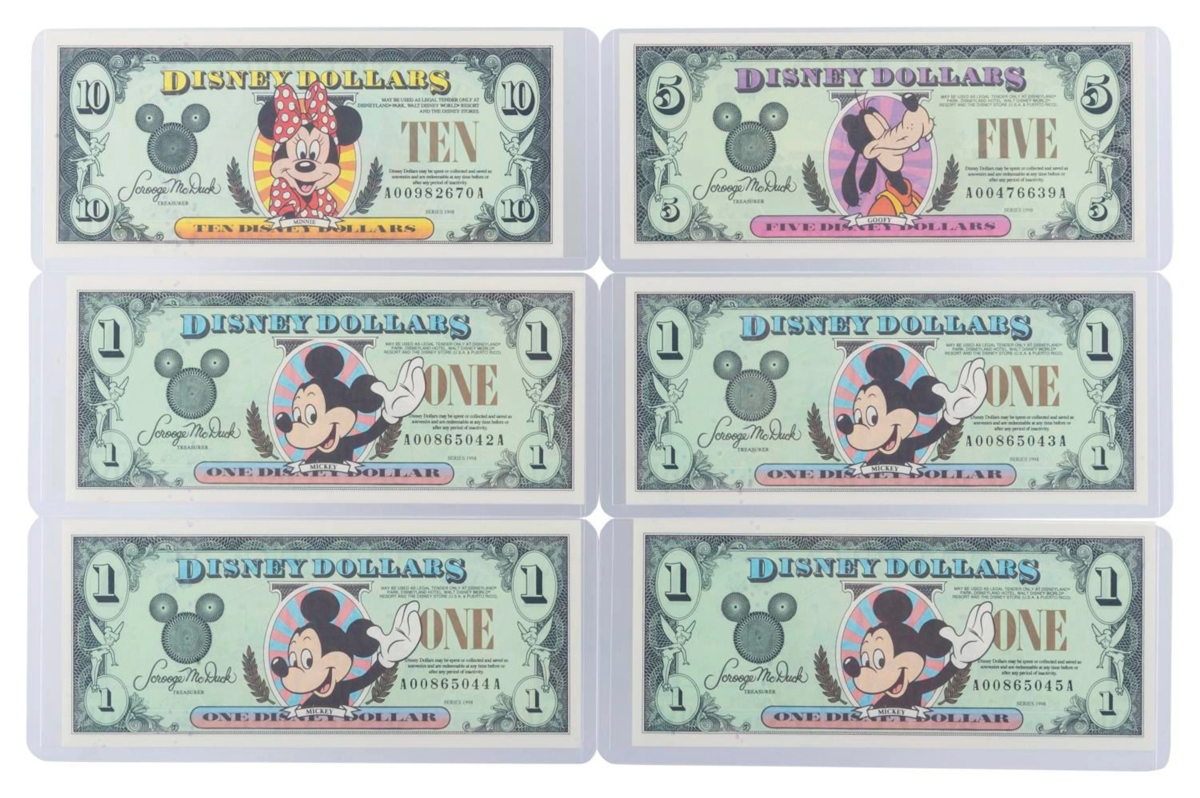 The Disneyland 1998 AA Series $1, $5, and $10 Bills.
