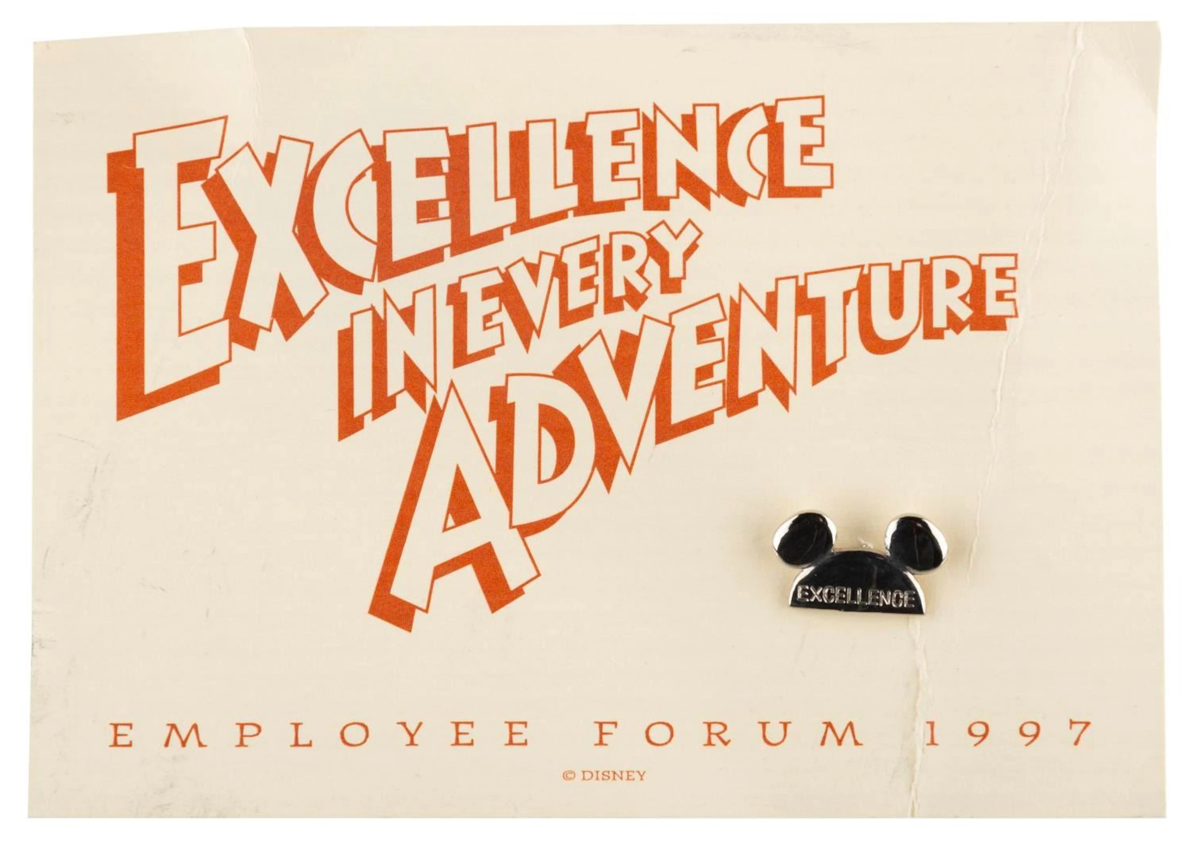 A Disney Employee Forum Pin and Card.