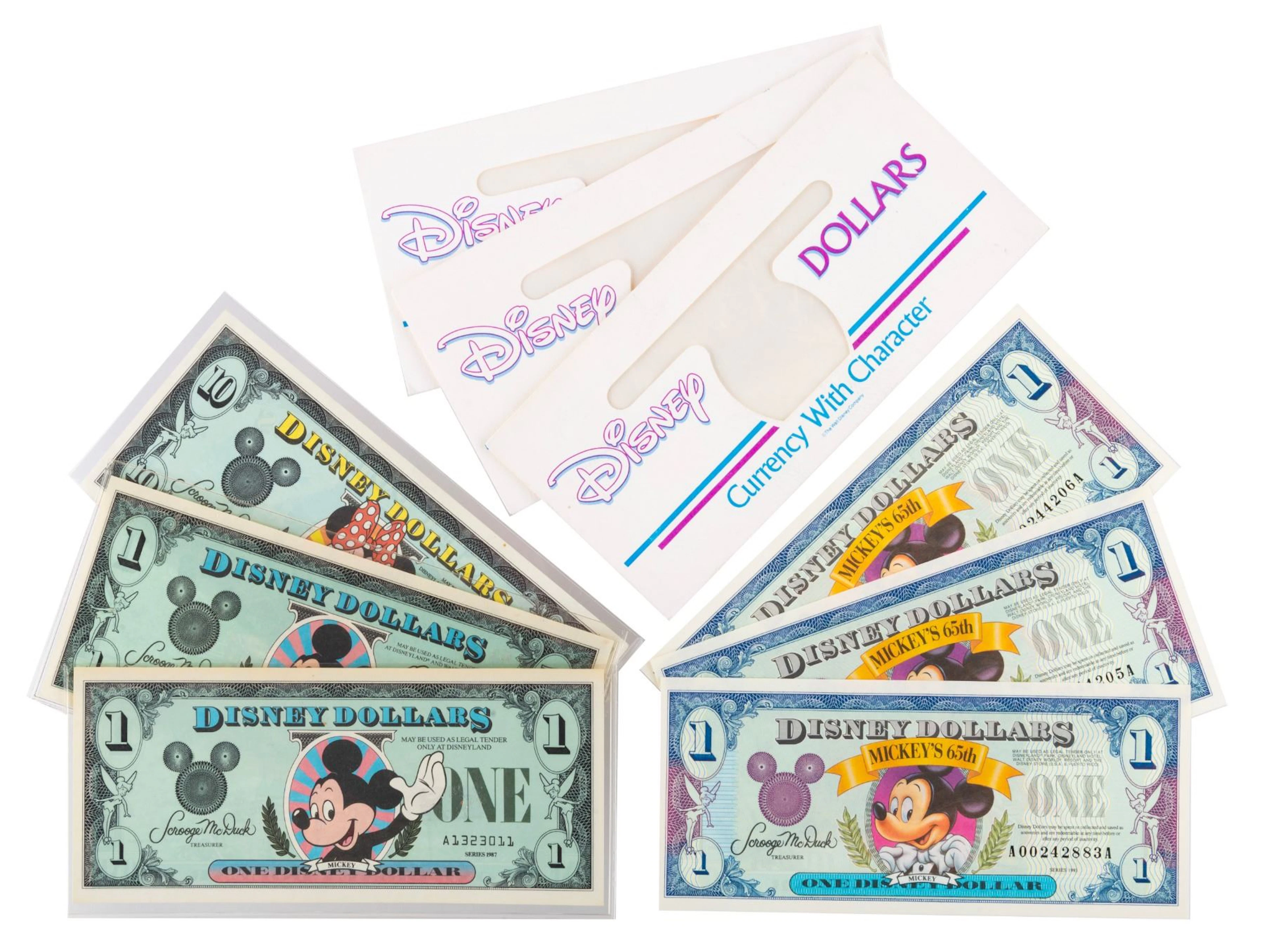A Collection of Disney Dollars.