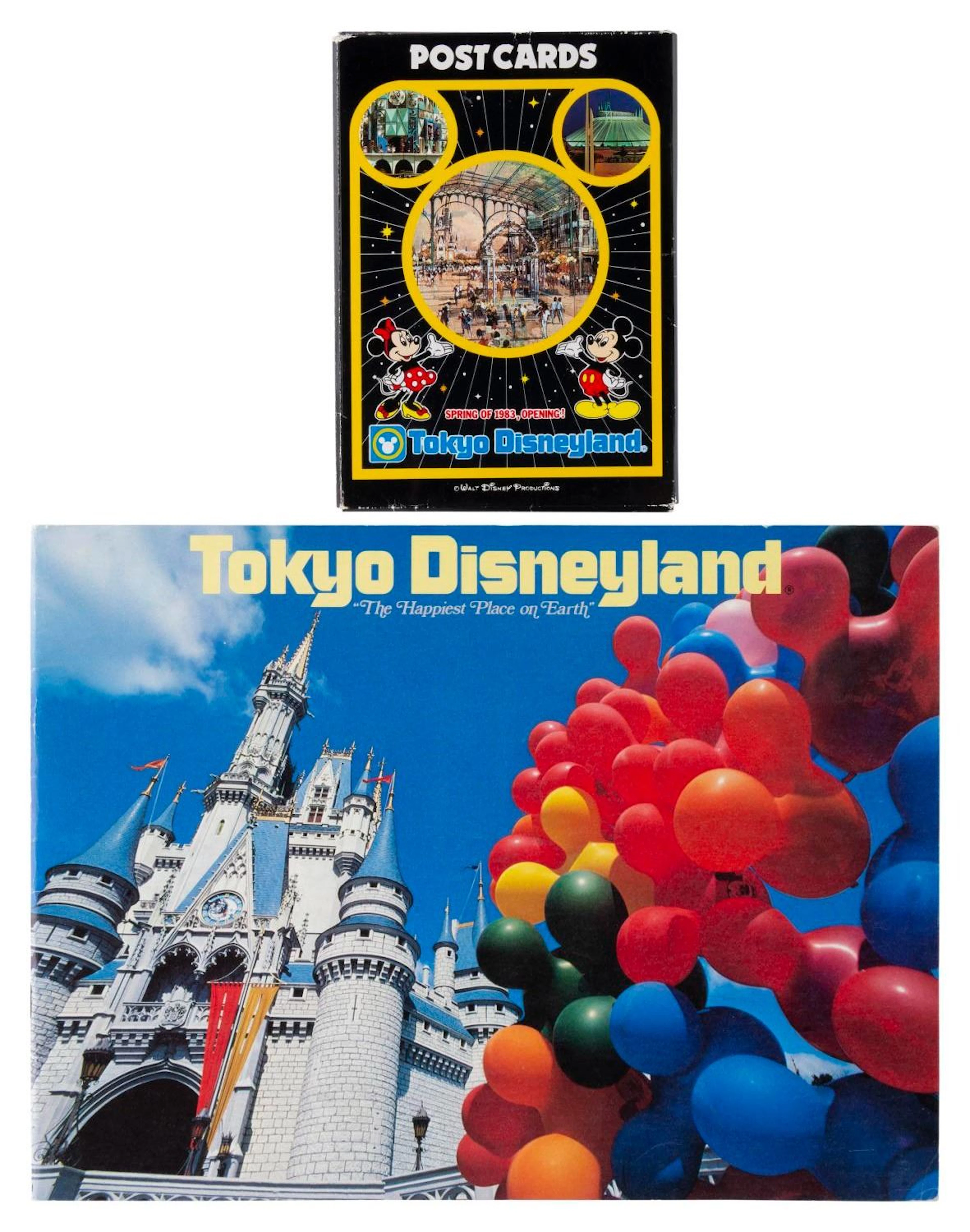 A Tokyo Disneyland Pre-Opening Booklet and Postcards Set.