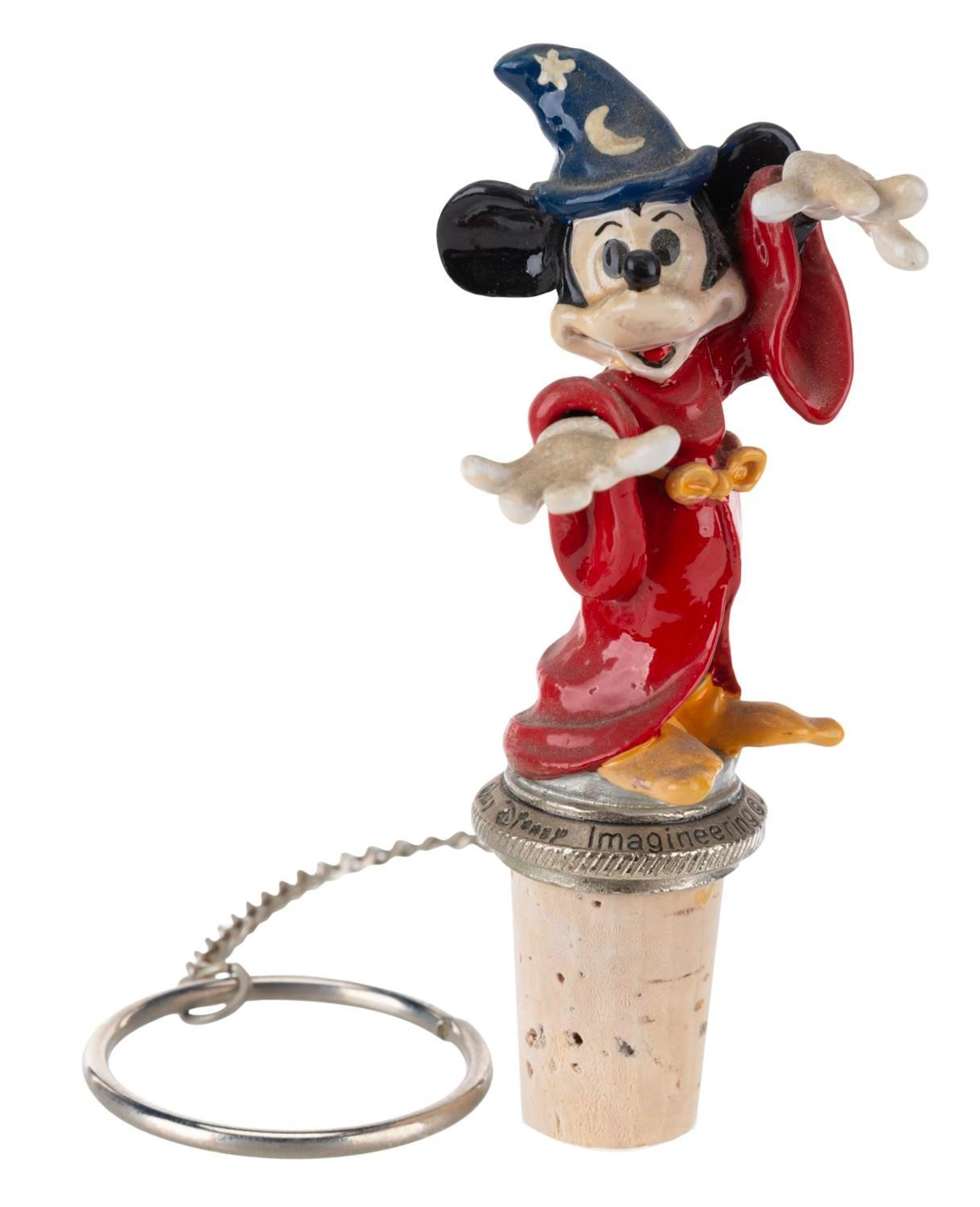 A Walt Disney Imagineering Wine Stopper Keychain.