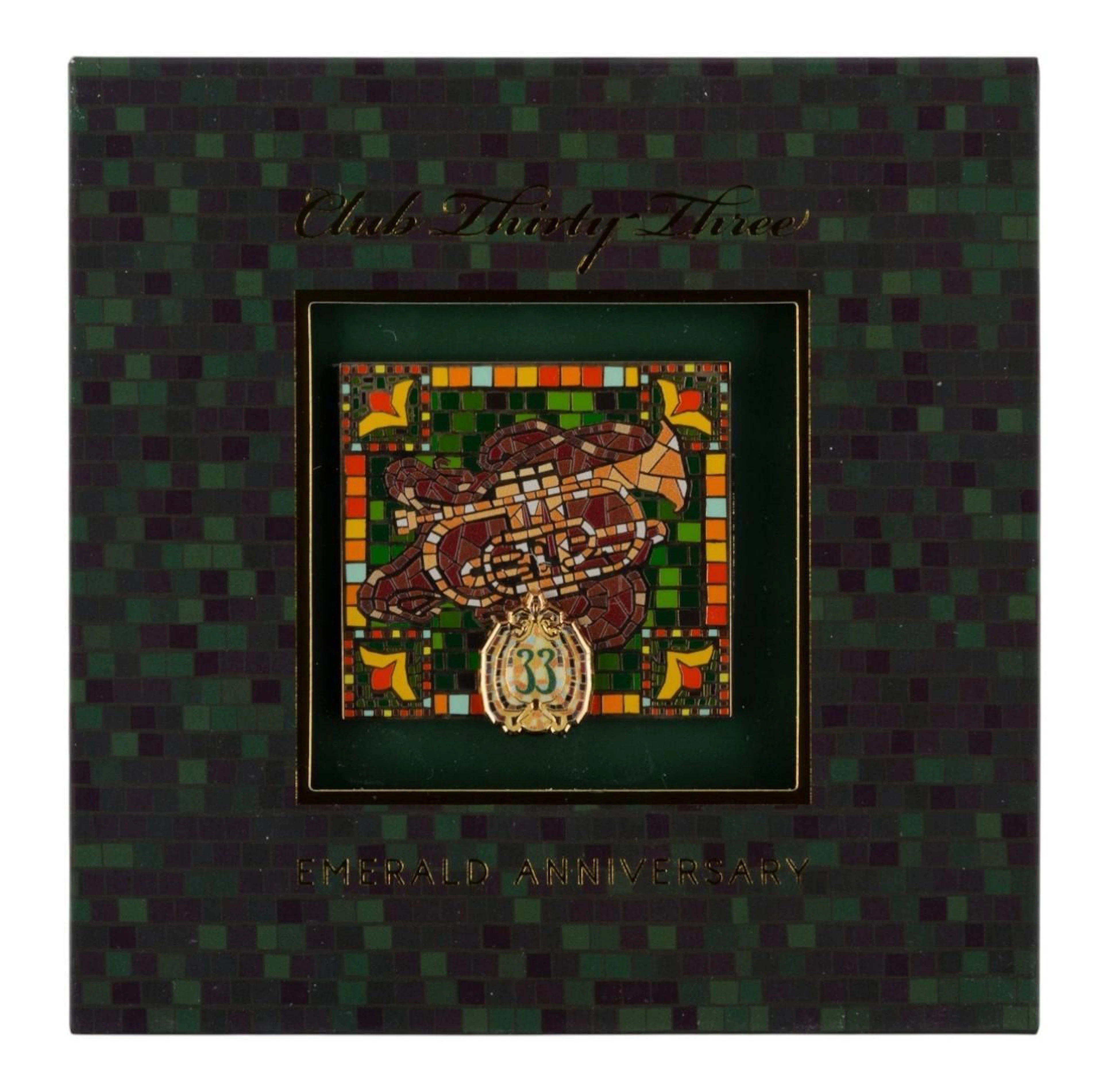 A Club 33 Commemorative Emerald Anniversary Trumpet Pin.