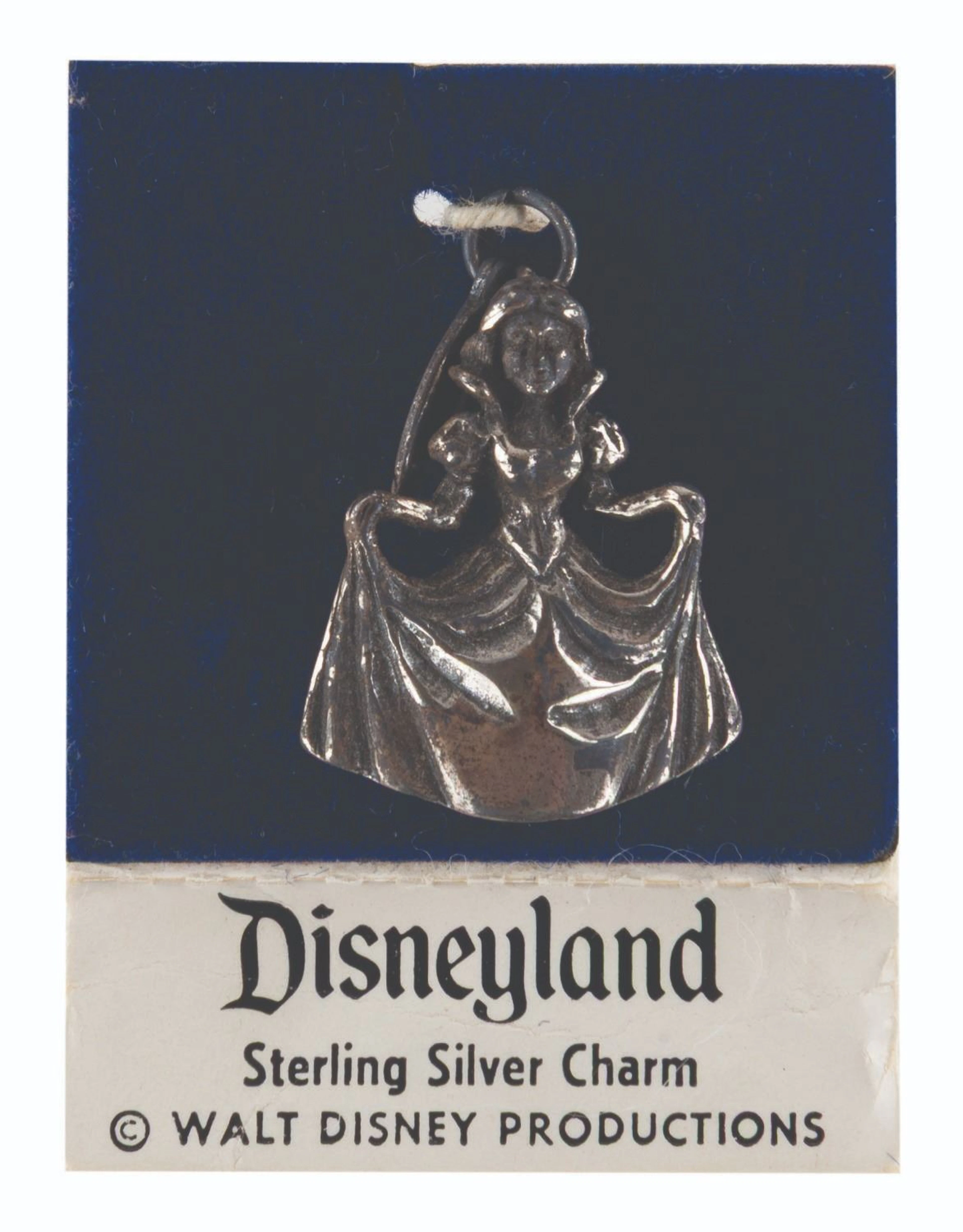 A Sterling Silver "Snow White" Charm.