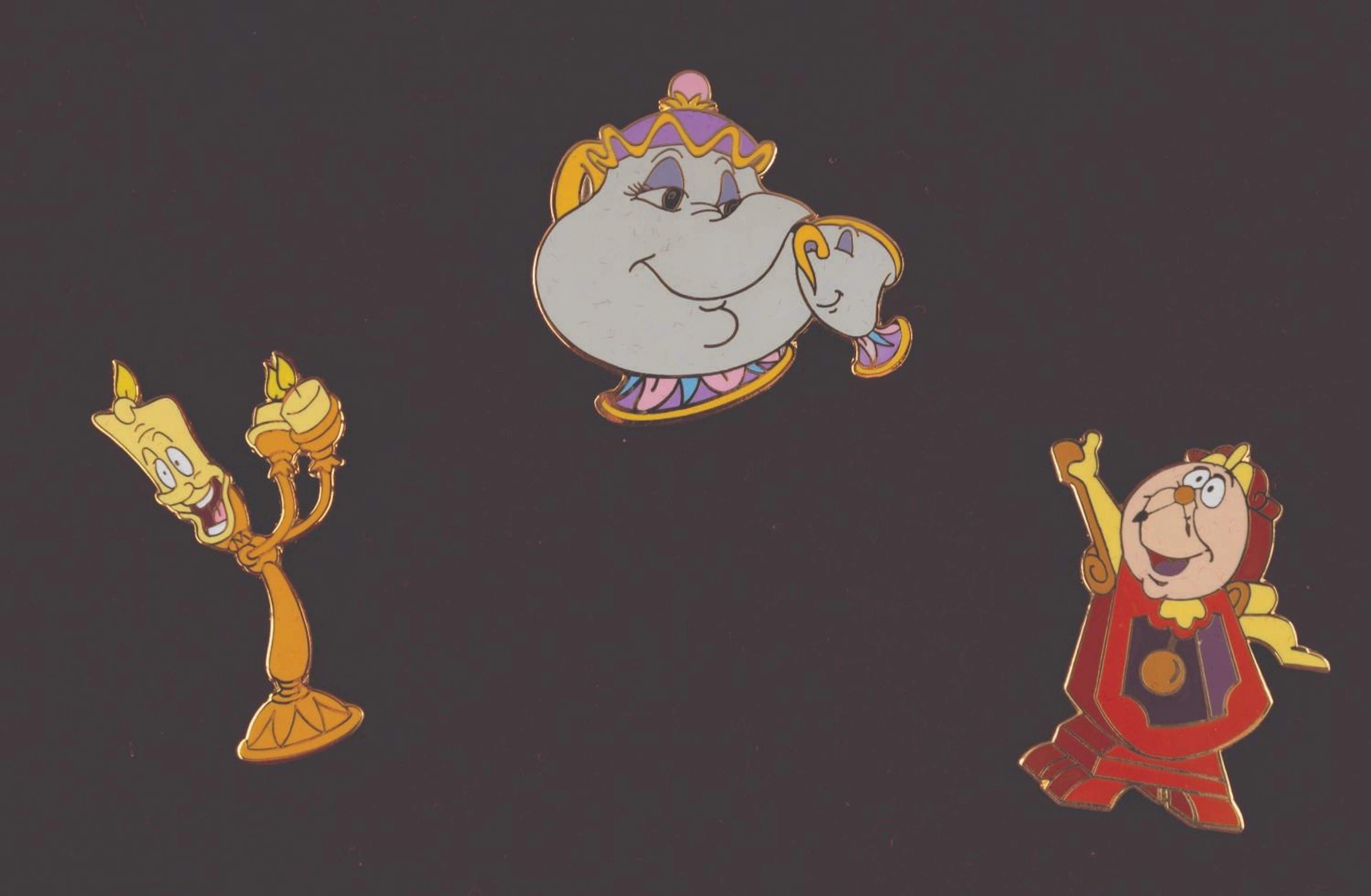 A WDCC "Beauty and the Beast " Pin Set.