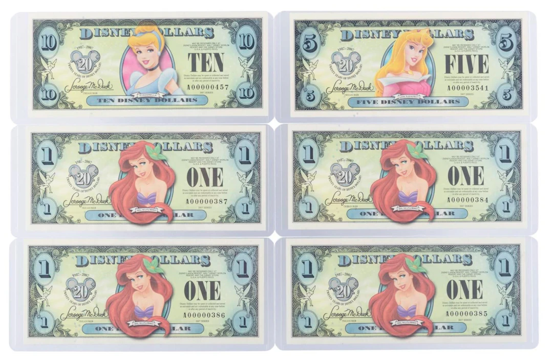 The 2007 Disney Dollars 20th Anniversary Series $1, $5, and $10 Bills.
