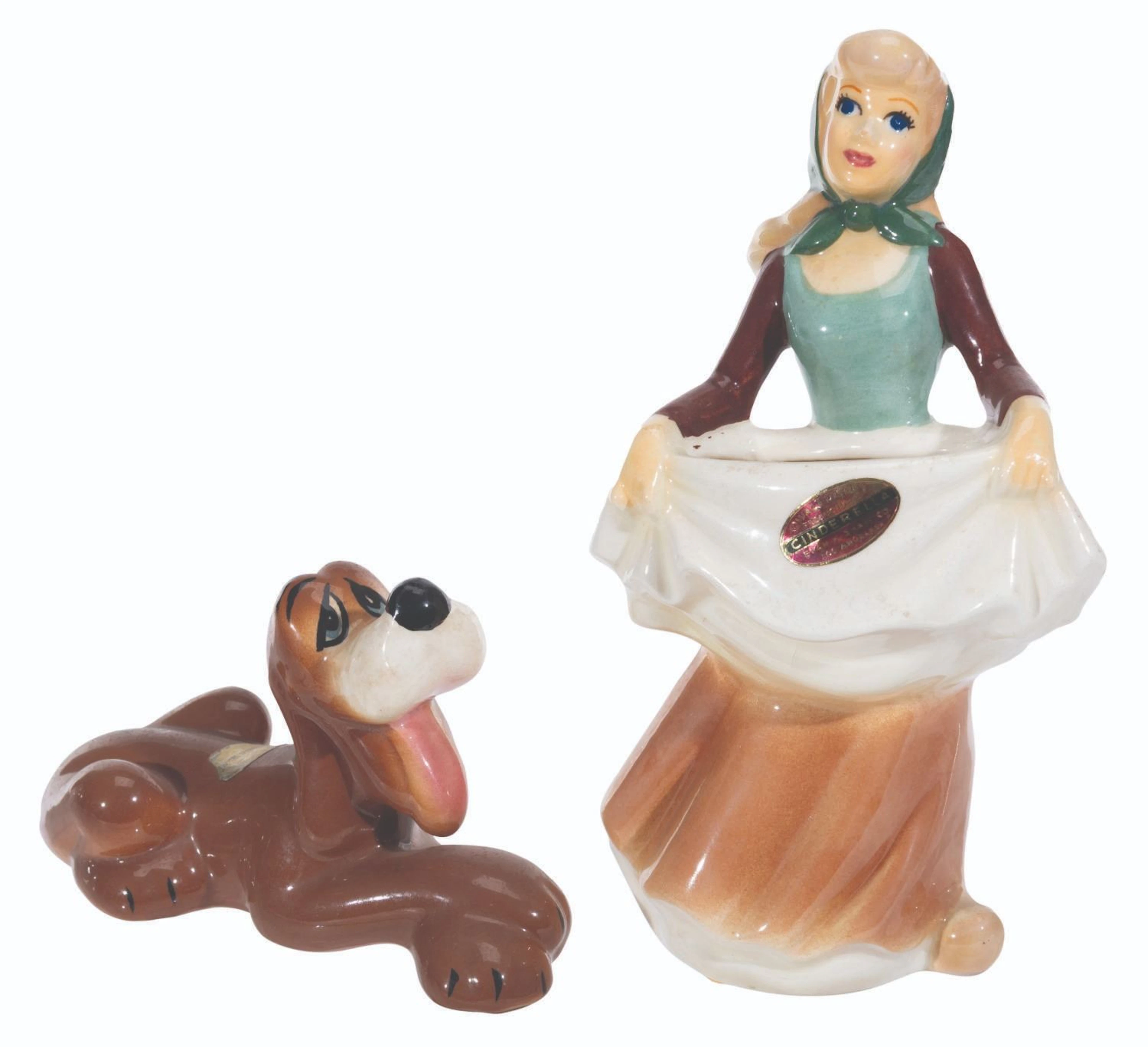 A Pair of Cinderella and Bruno Figurines by Evan K. Shaw.