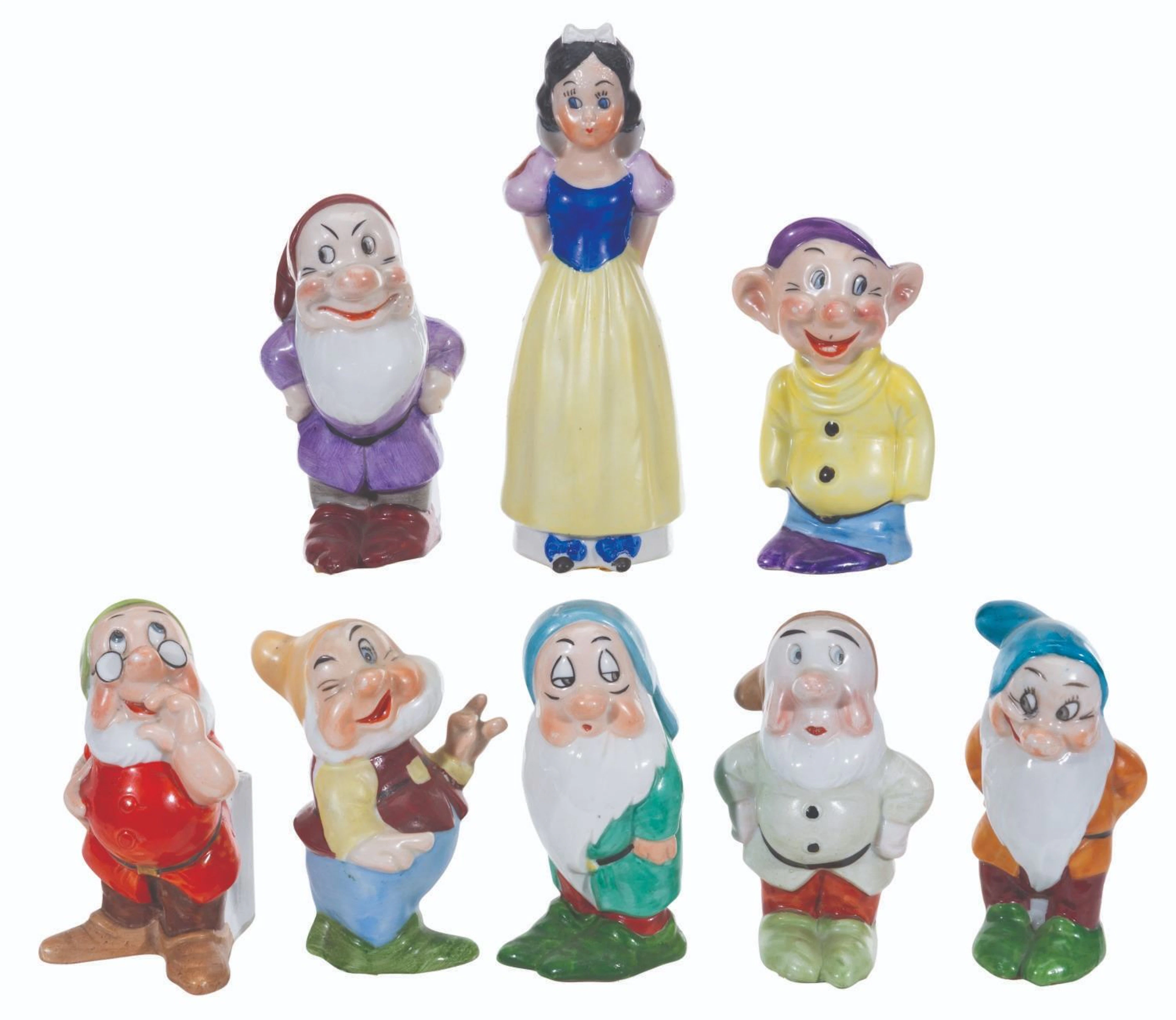 A Set of Maw "Snow White and the Seven Dwarfs" Toothbrush Holders.