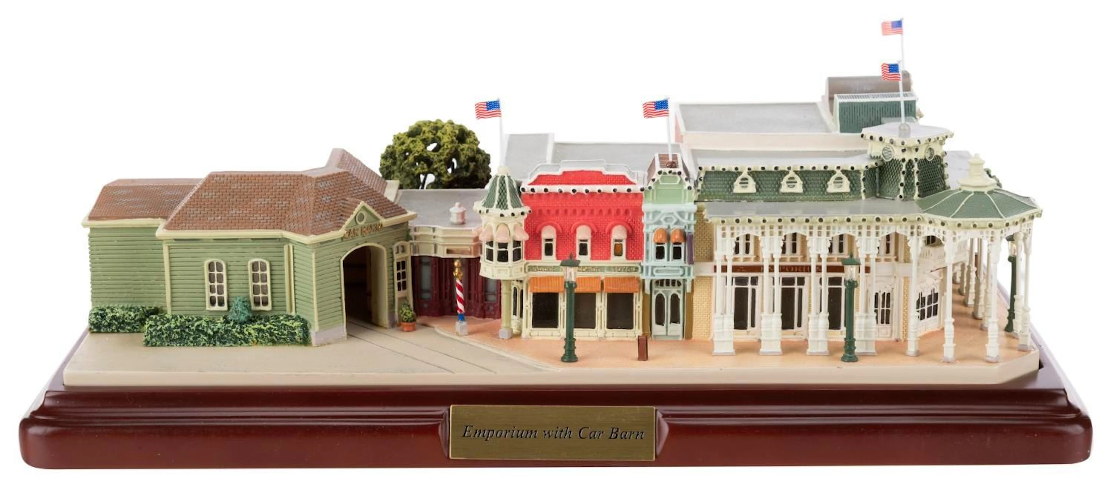 A First Edition Olszewski Walt Disney World Emporium with Car Barn.