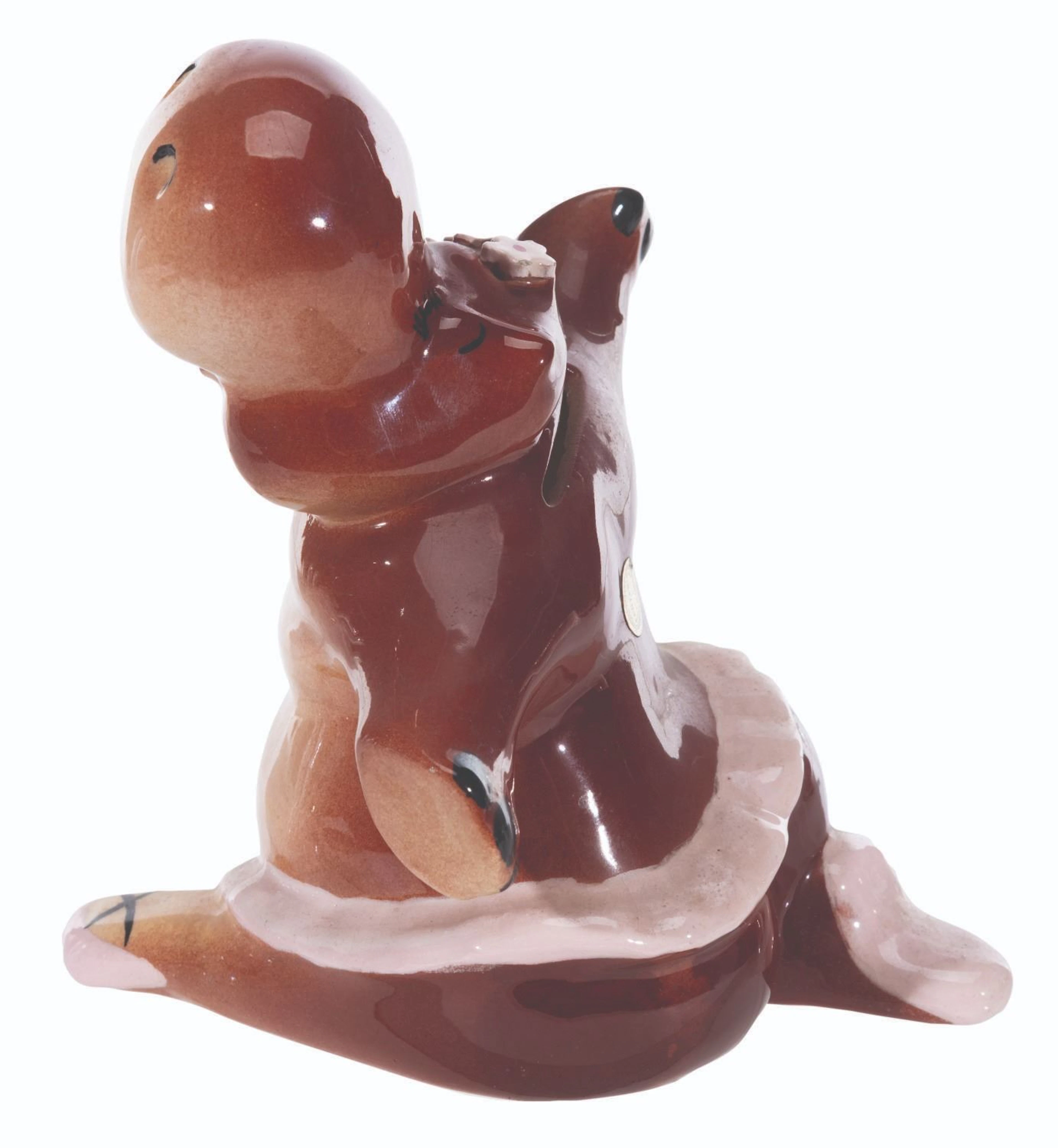 A "Fantasia" Ballerina Hippo Coin Bank.