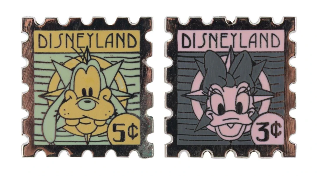 A Pair of Disneyland Goofy and Daisy Duck Stamp Pins.