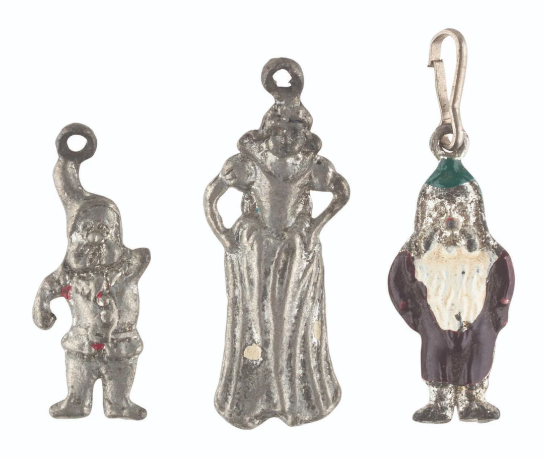 Three "Snow White and the Seven Dwarfs" Charms.