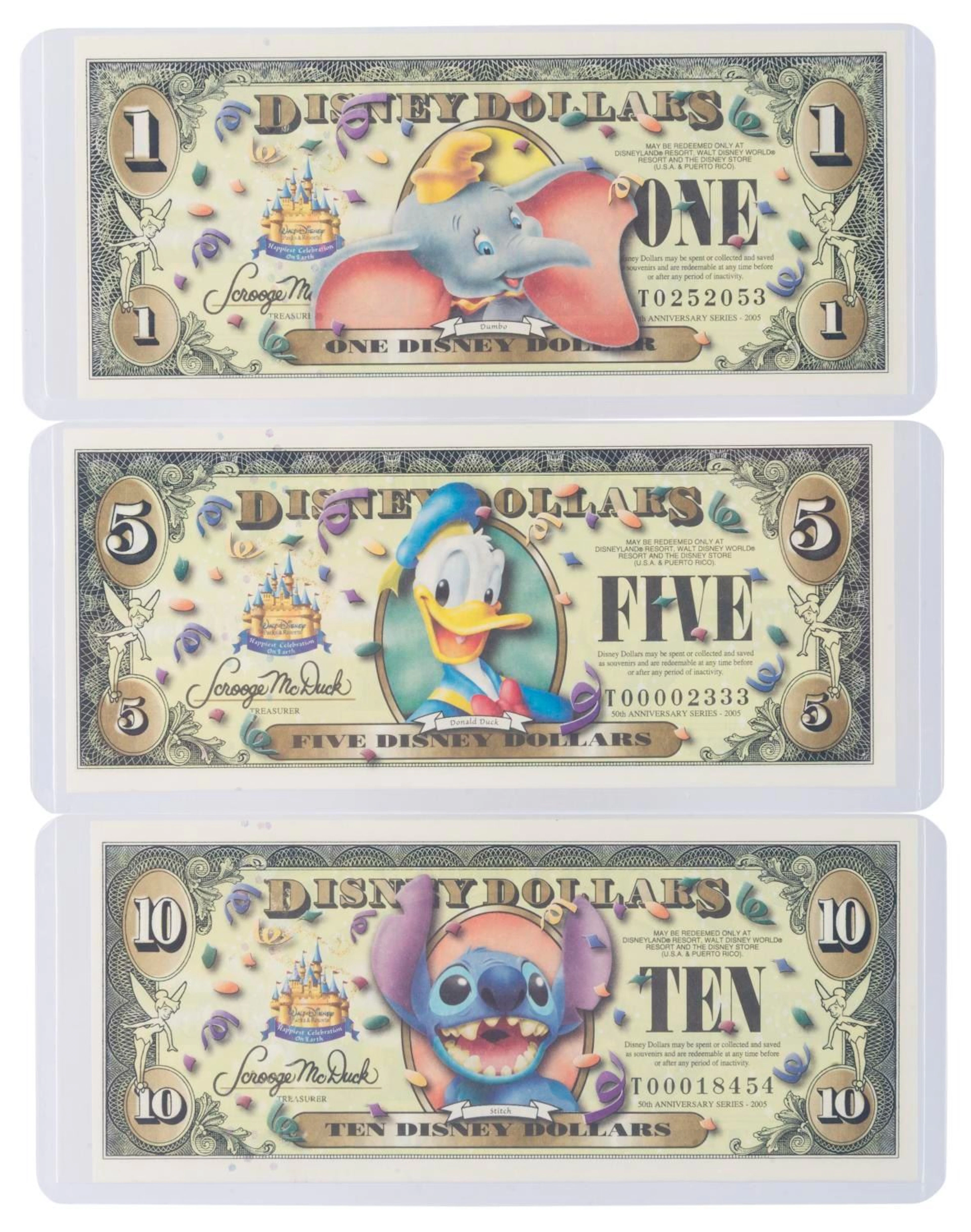 The Disney Store 2005 T First Series $1, $5, and $10 Bills.