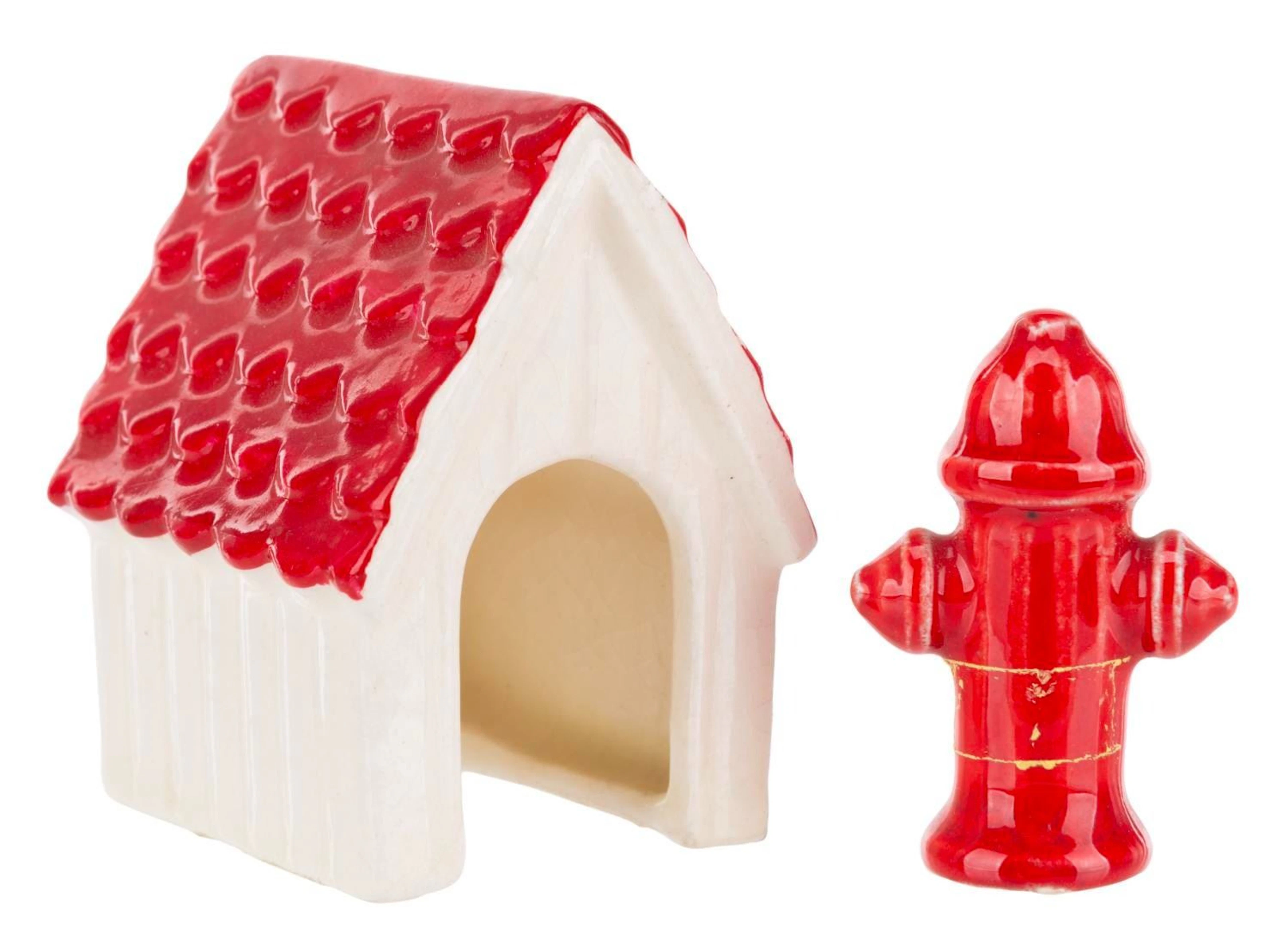 A 1940s Fire Hydrant and Dog House Figurine Set.