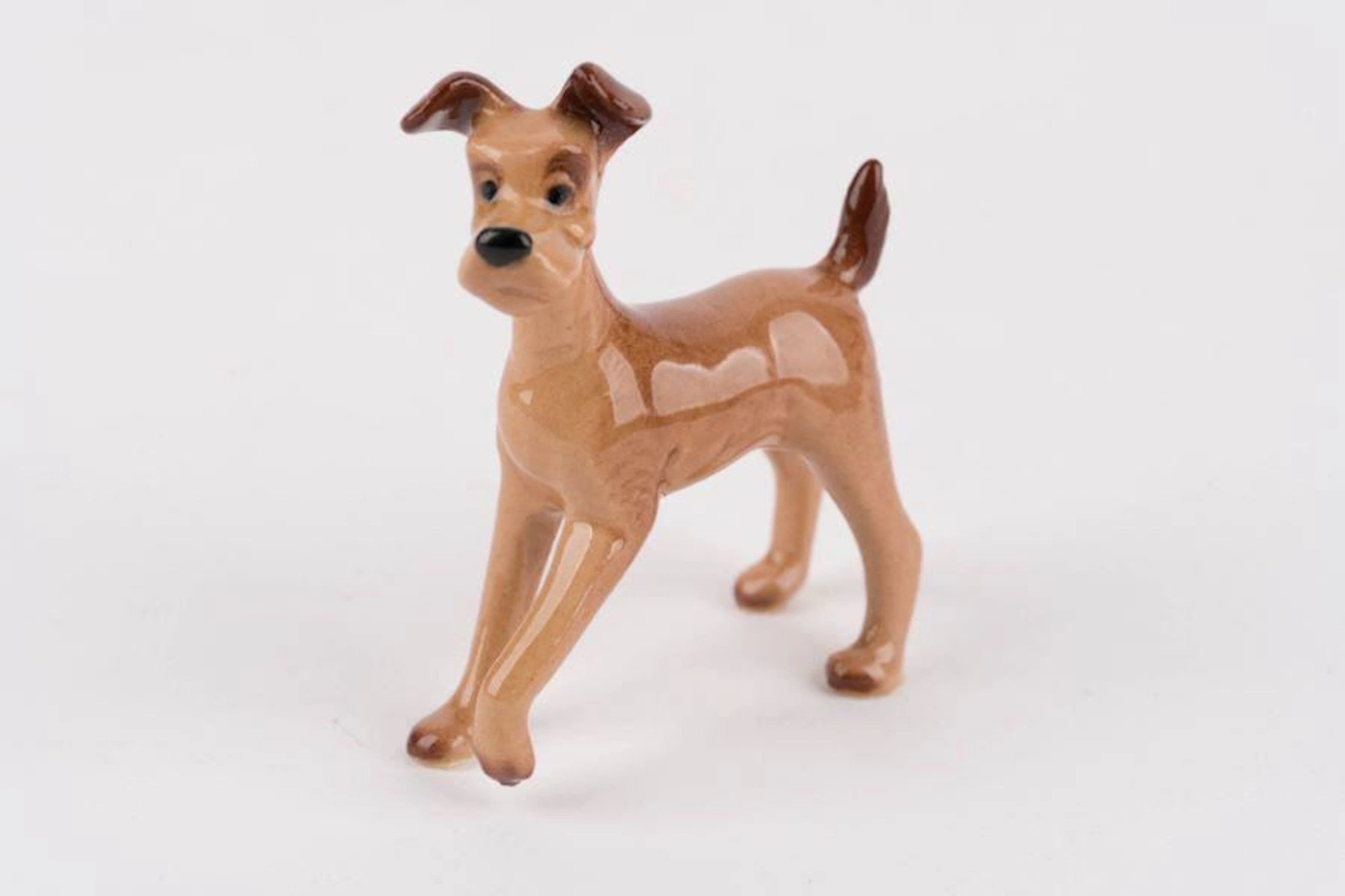 A "Lady and the Tramp" Miniature Ceramic Figurine by Hagen Renaker.