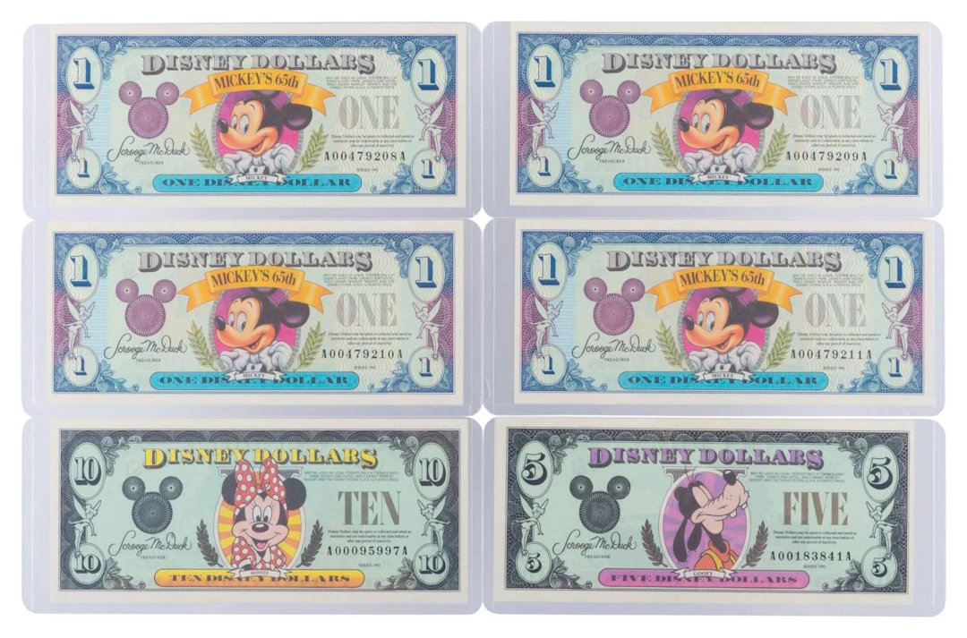 The Disneyland 1993 AA Series $1, $5, and $10 Bills.