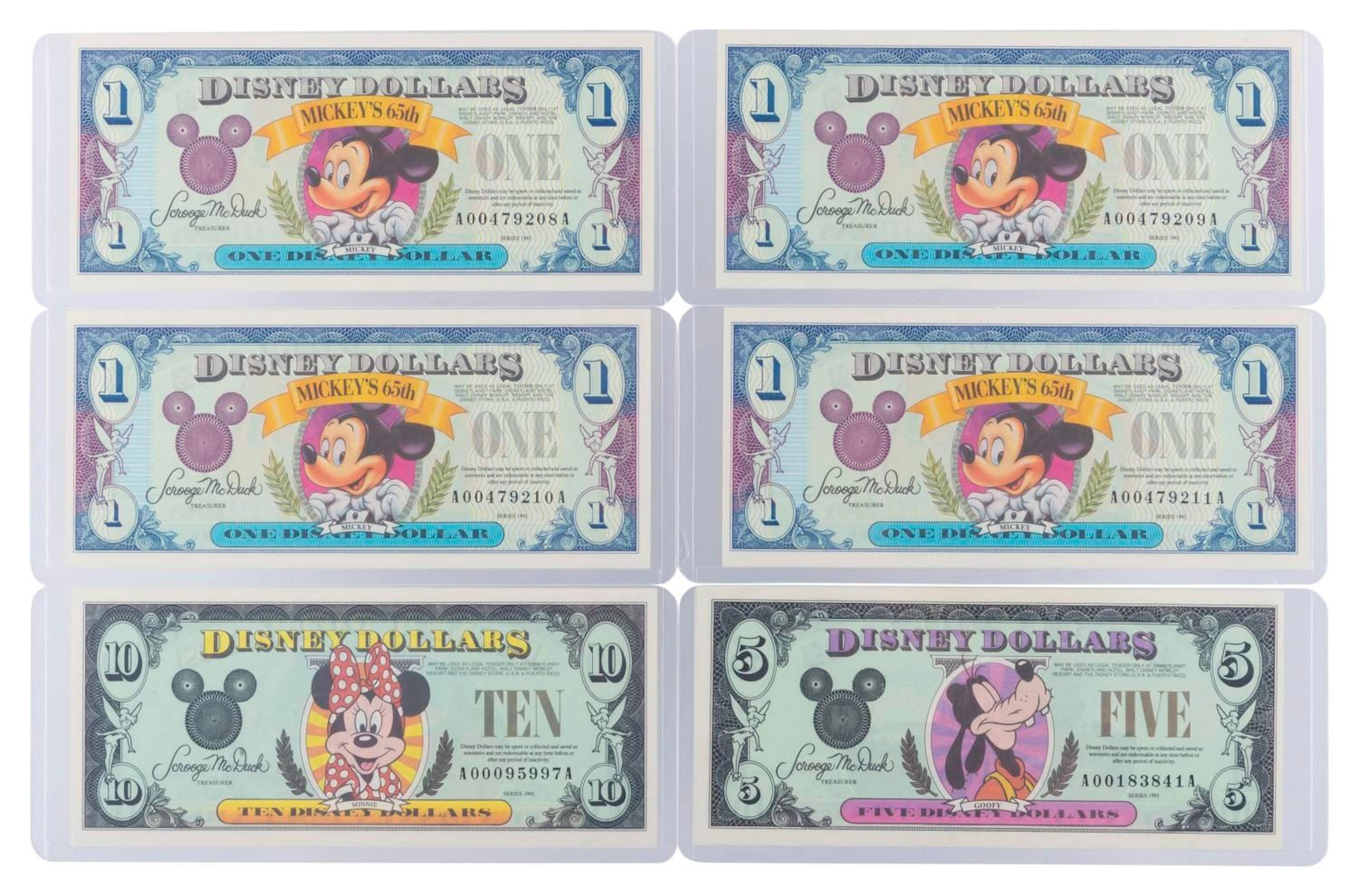The Disneyland 1993 AA Series $1, $5, and $10 Bills.