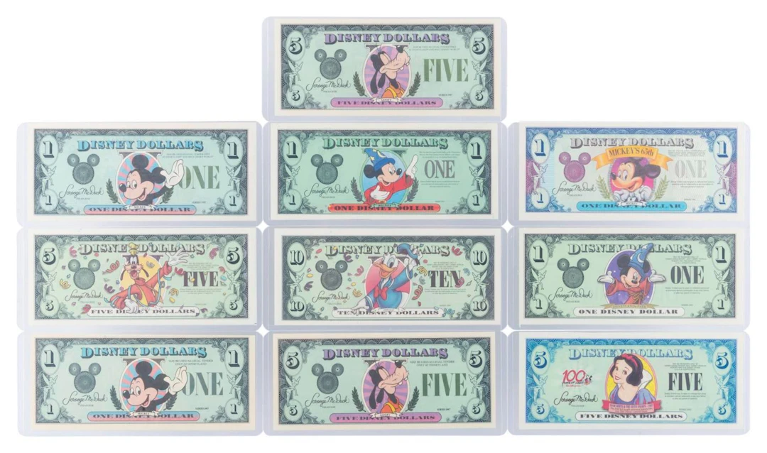 A Collection of 10 Disney Dollars with No Serial Numbers
