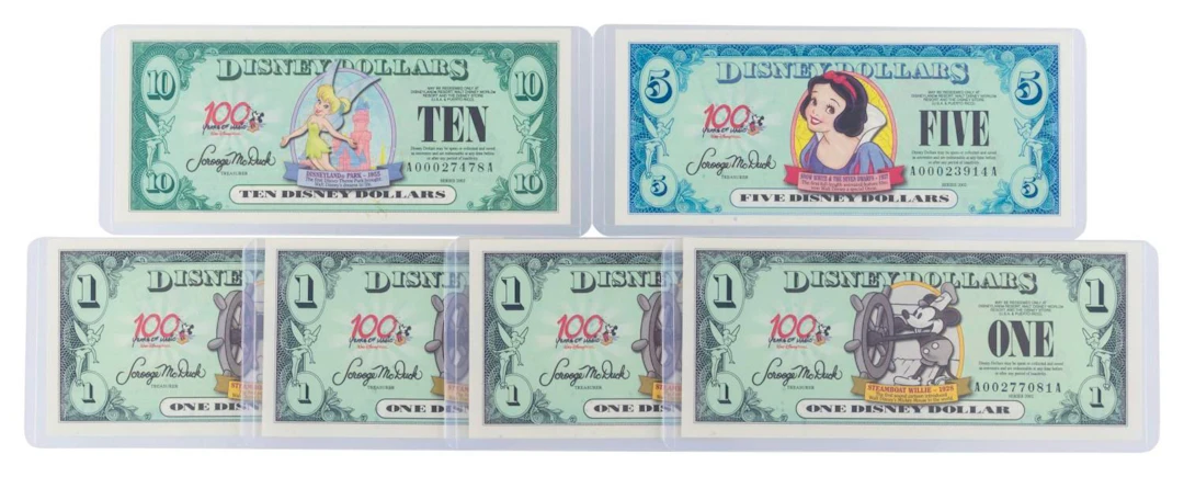 The Disneyland 2002 AA Series $1, $5, and $10 Bills.