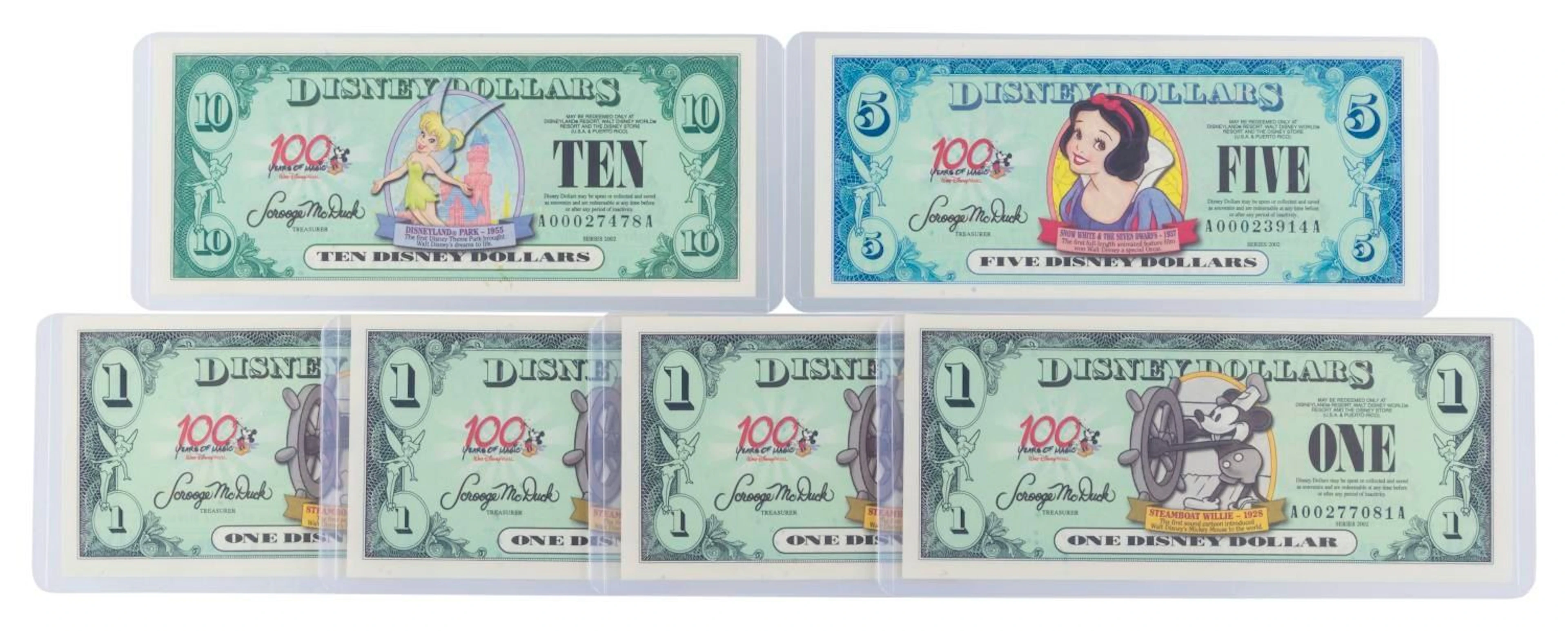 The Disneyland 2002 AA Series $1, $5, and $10 Bills.