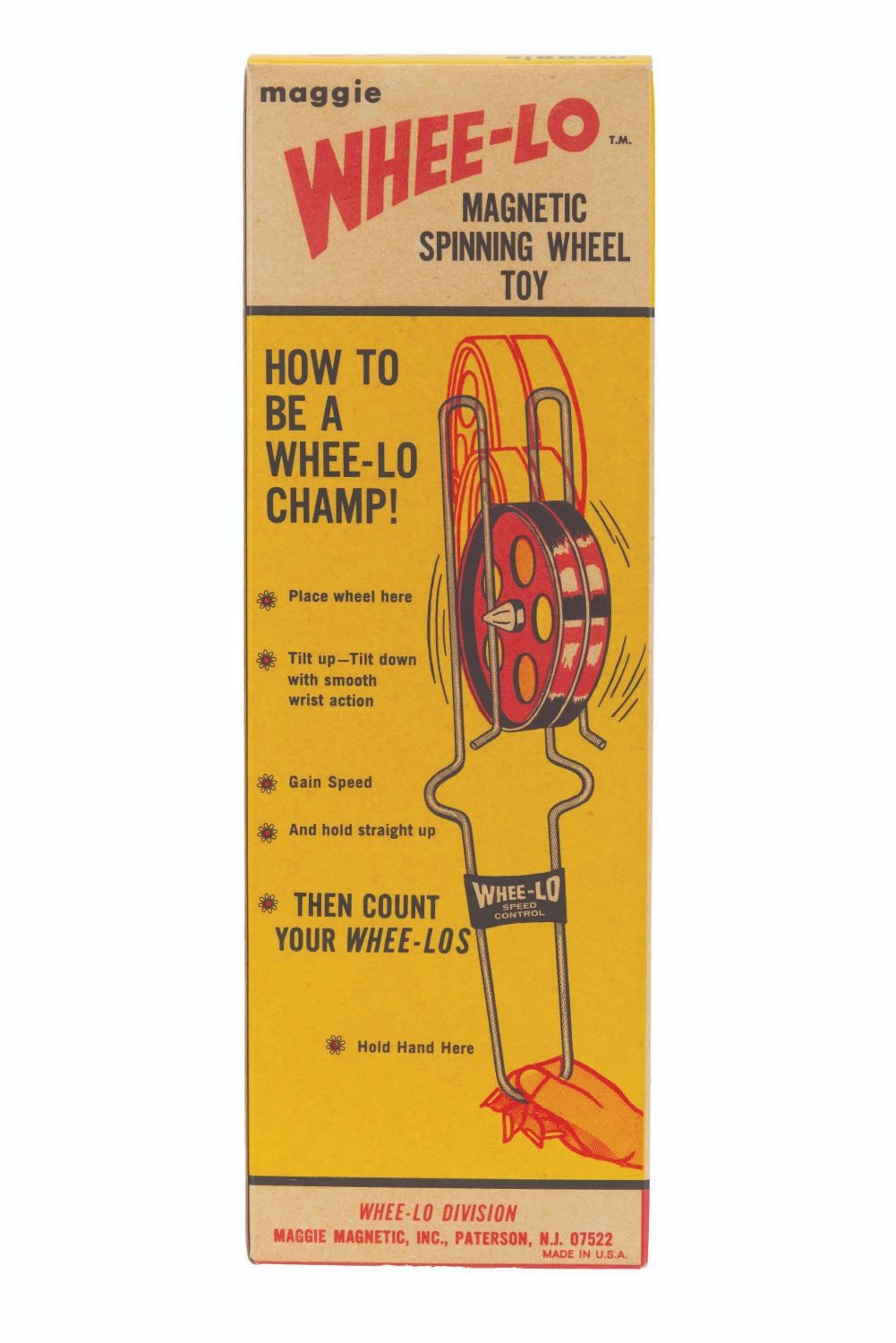 A Whee-Lo Spinner Toy in the Box.