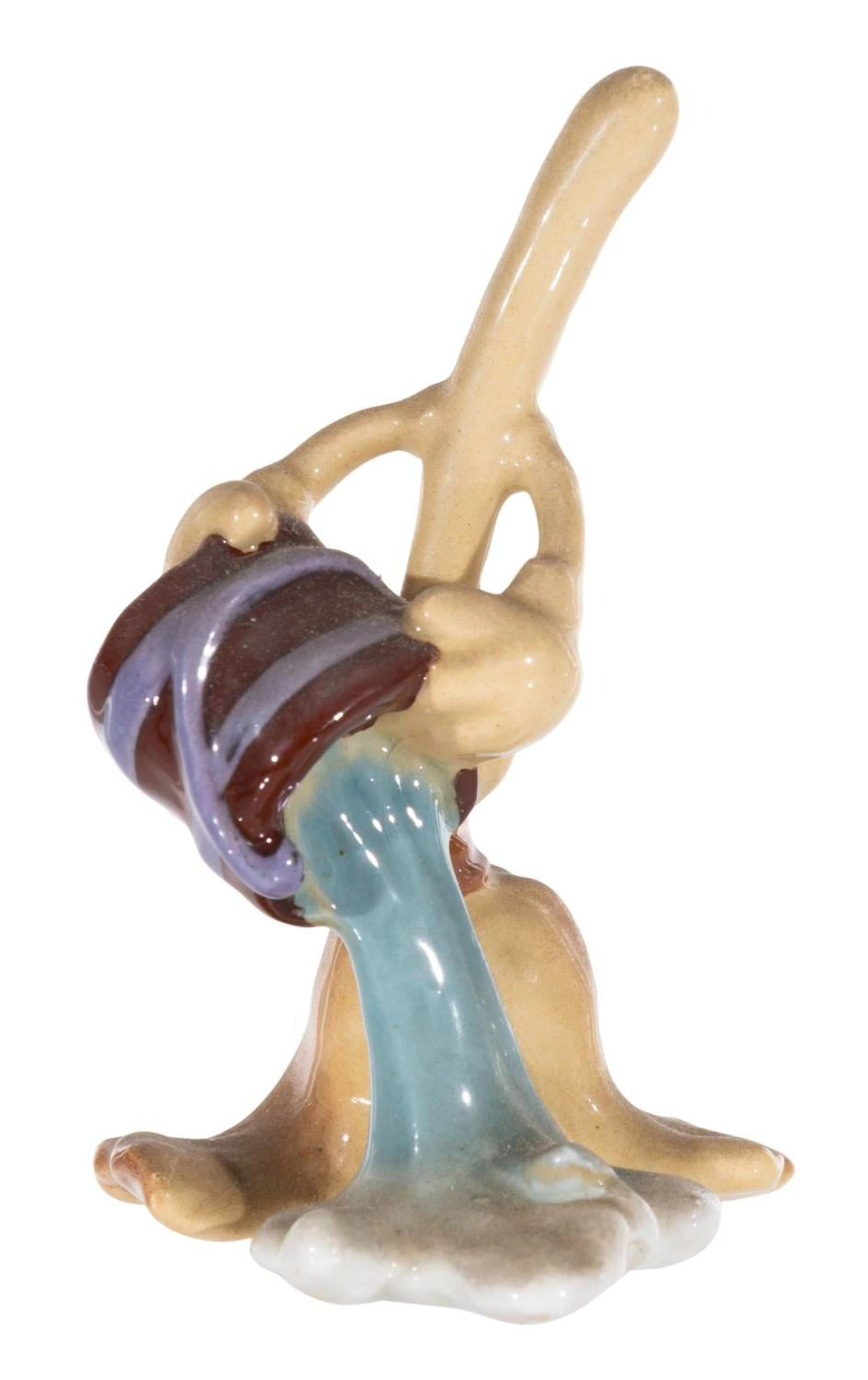 A"Fantasia" Enchanted Broom Ceramic Figurine.