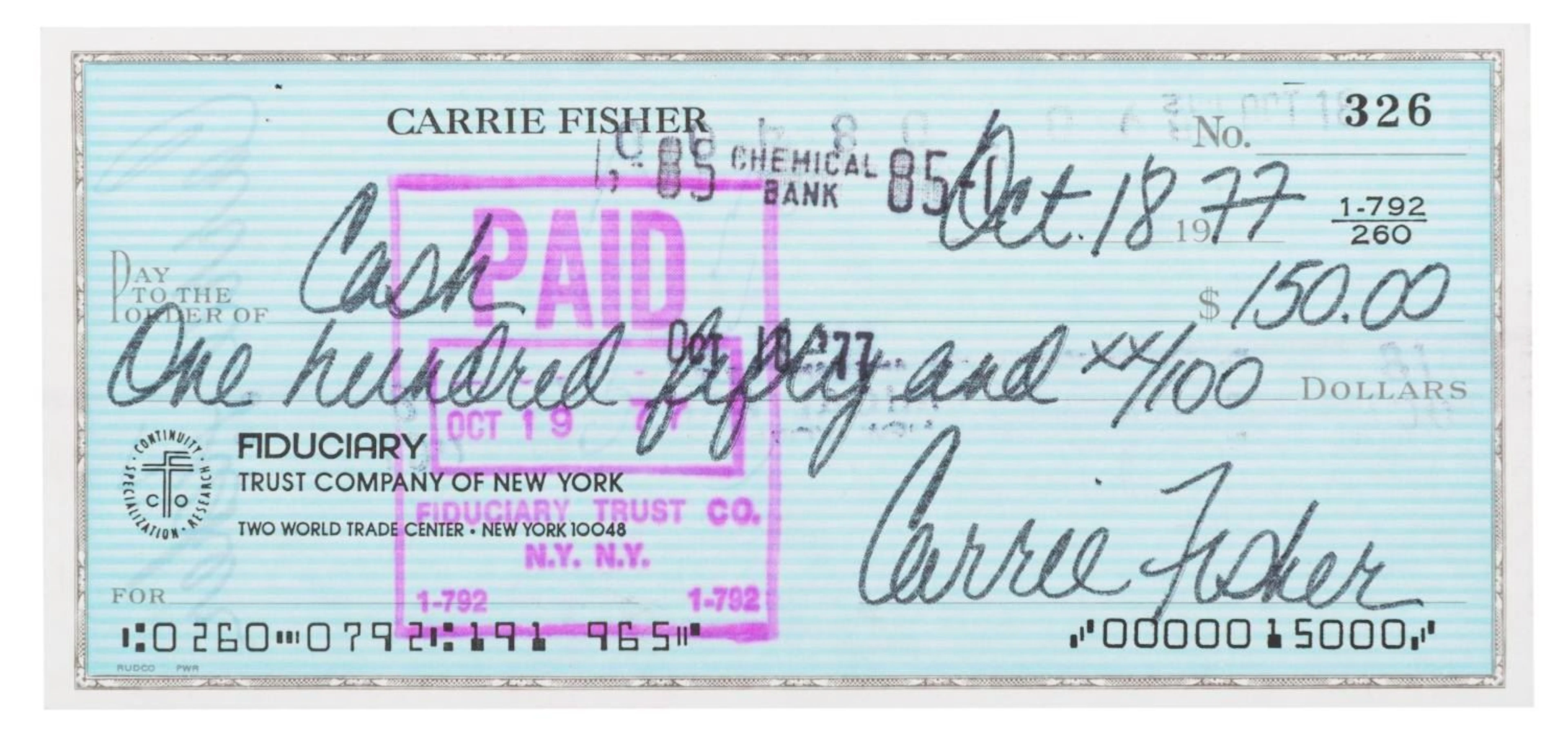 A Carrie Fisher Signed Check.