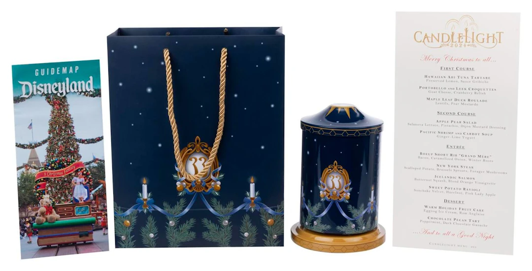 A Club 33 Candlelight Processional Cookie Tin Music Box and Menu.