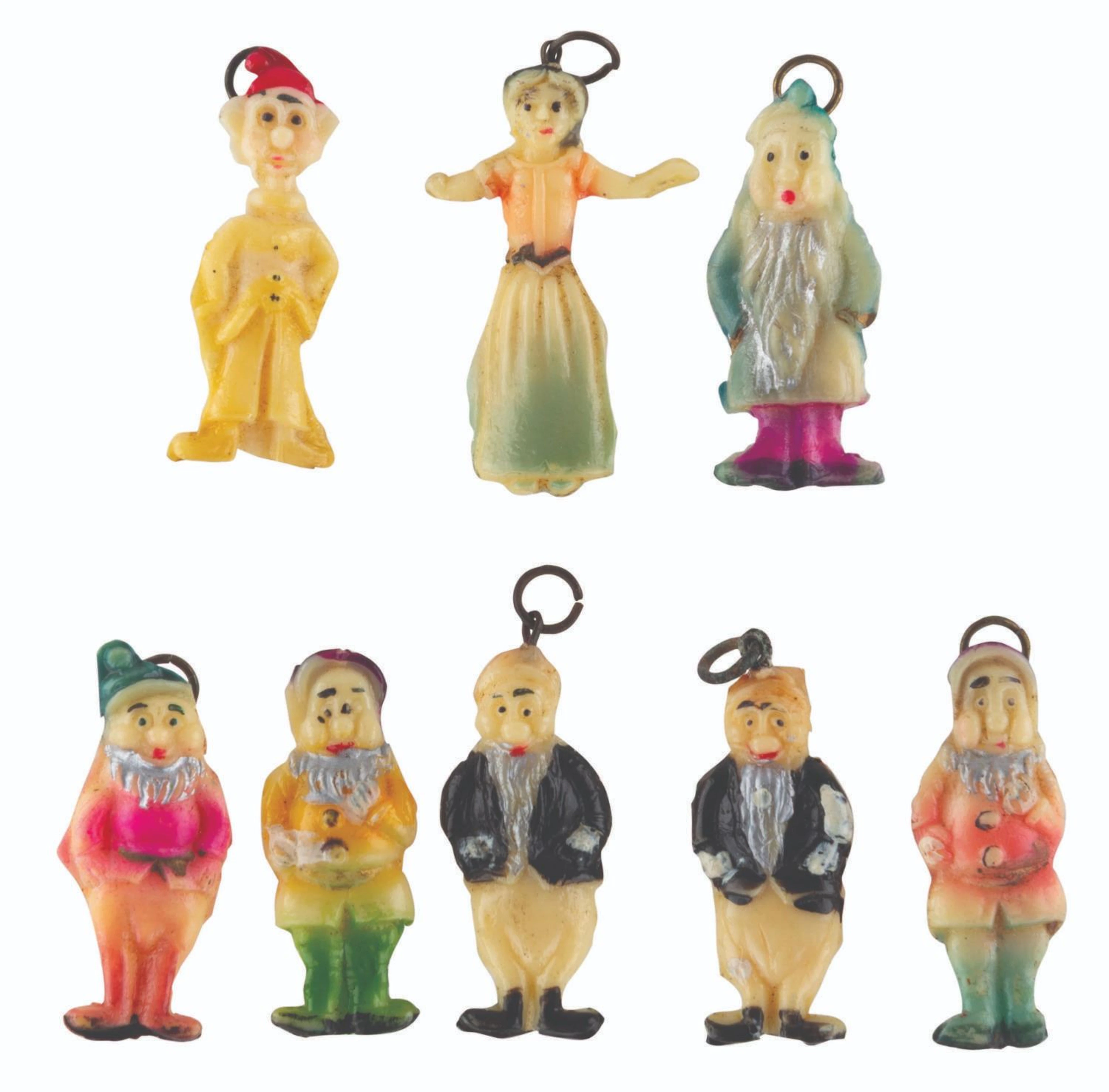 An Early "Snow White and the Seven Dwarfs" Charm Collection.
