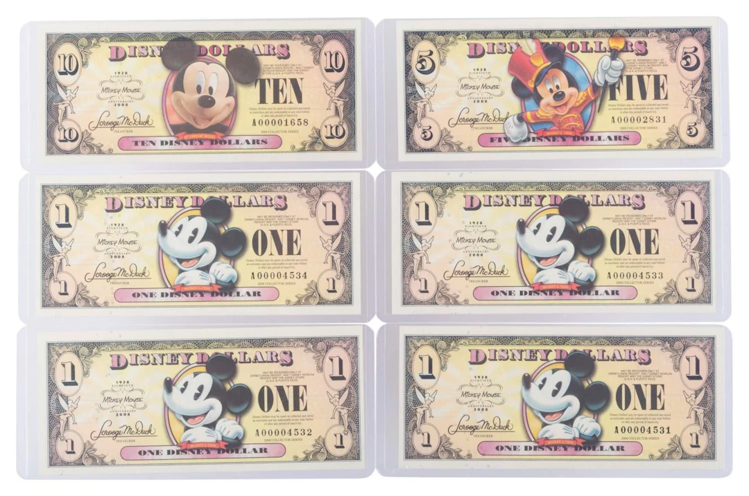 The 2008 Disney Dollars Mickey's 80th Anniversary Series $1, $5, and $10 Bills.