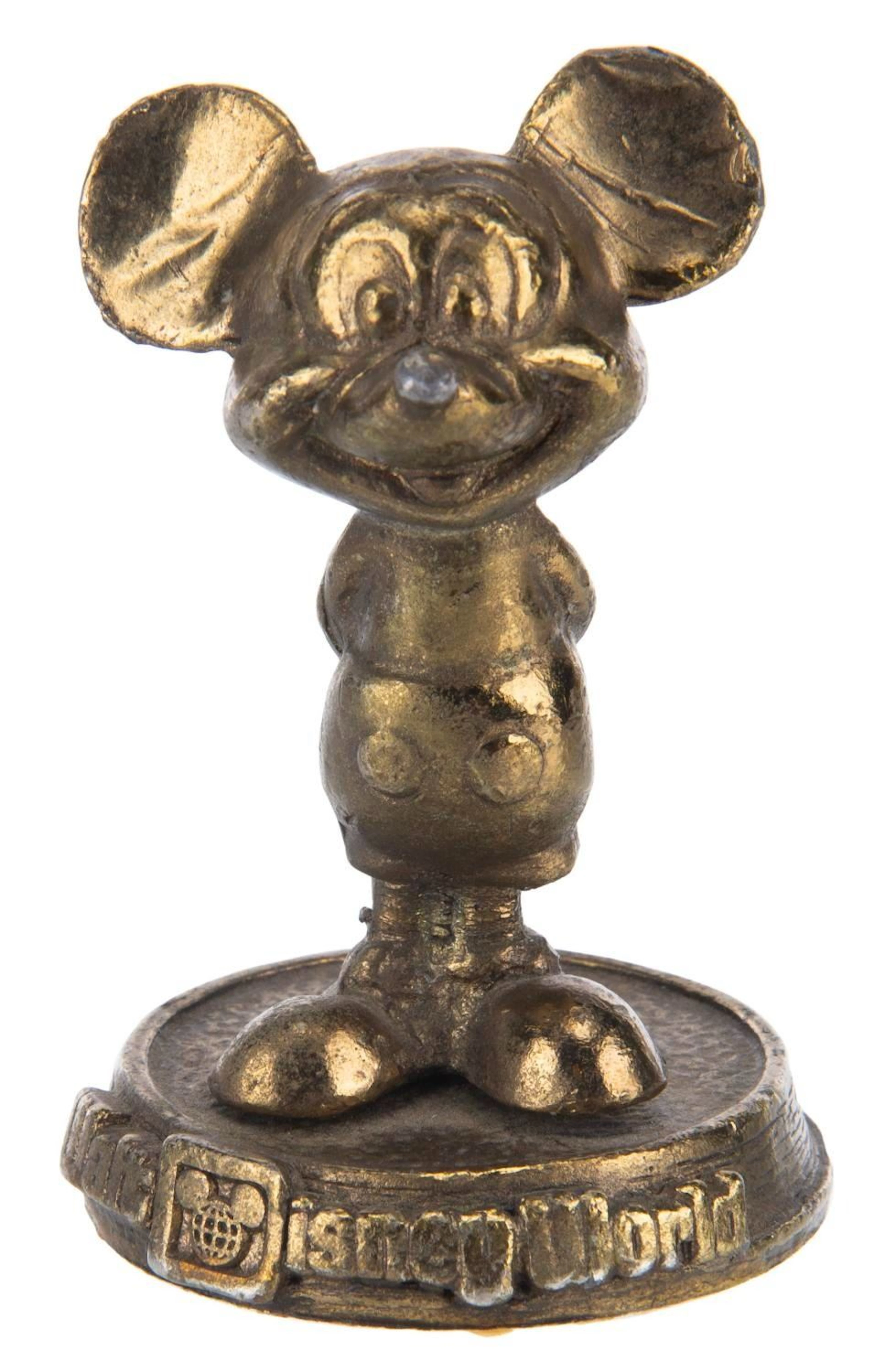 A Walt Disney World Mickey Mouse Paperweight.