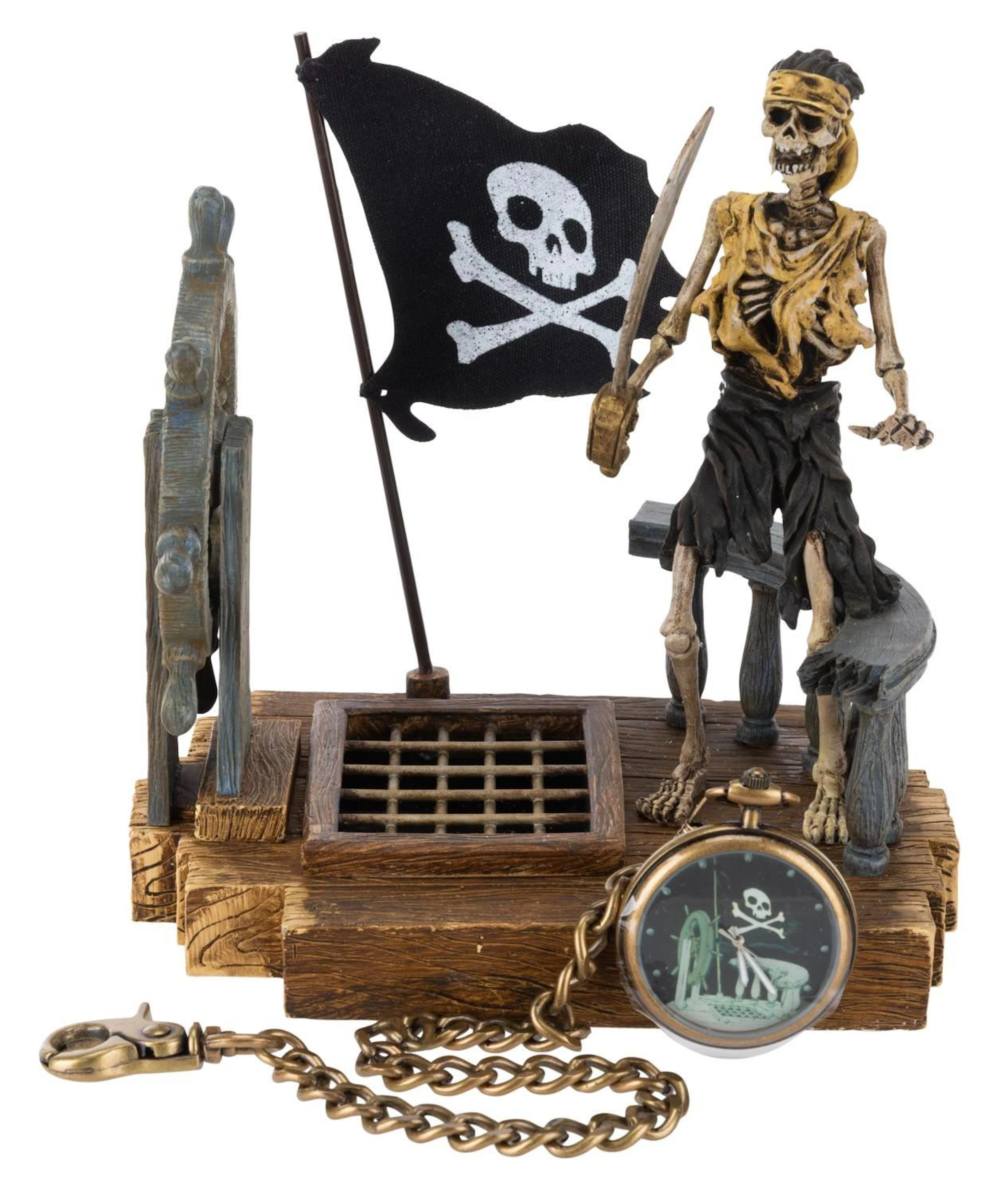 An Adventures on the 7 Seas Lagoon Figurine and Watch.