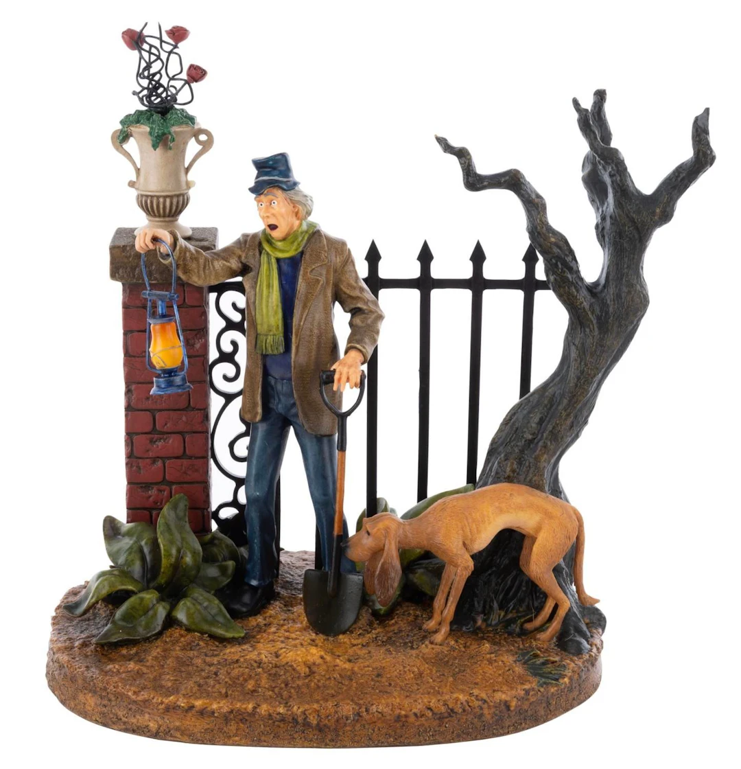 A Haunted Mansion Caretaker Figurine.