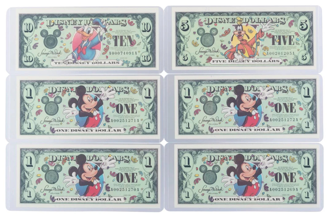 The Disneyland 2000 AA Series $1, $5, and $10 Bills.