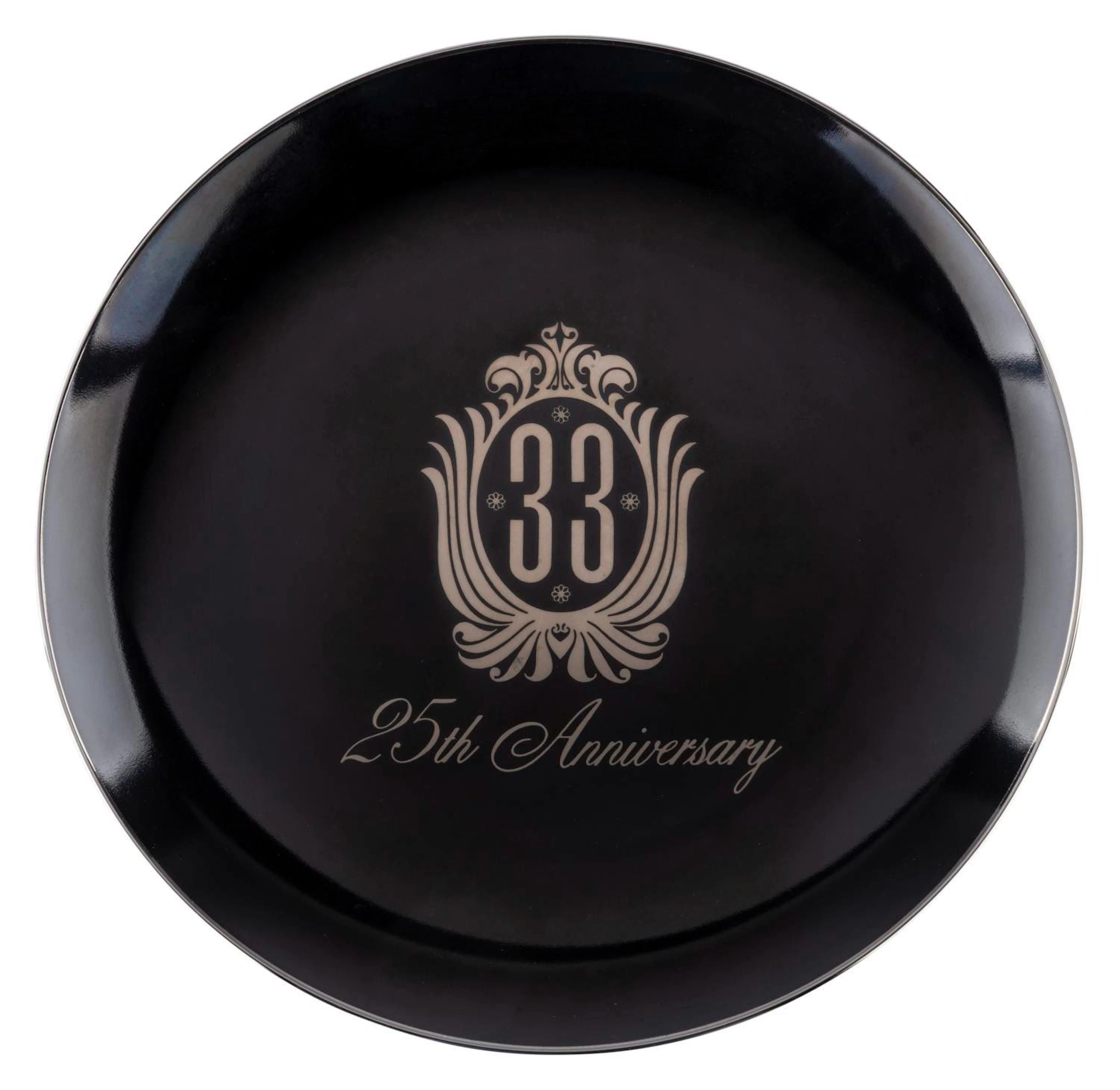 A Disneyland Club 33 25th Anniversary Plate.