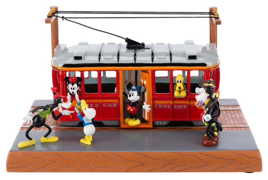 A Red Car Trolley Figurine.