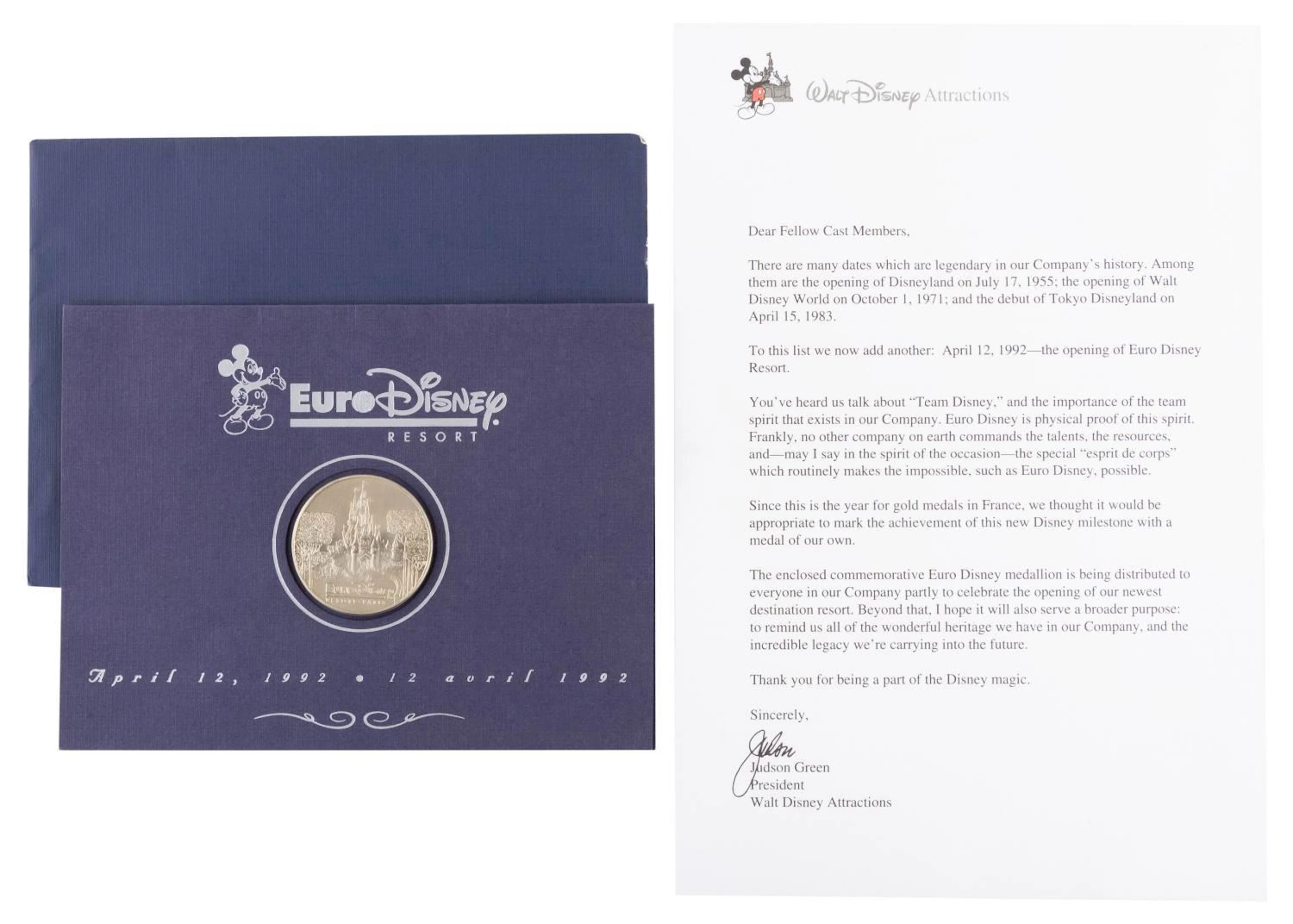 A Euro Disney Cast Member Grand Opening Coin and Letter.