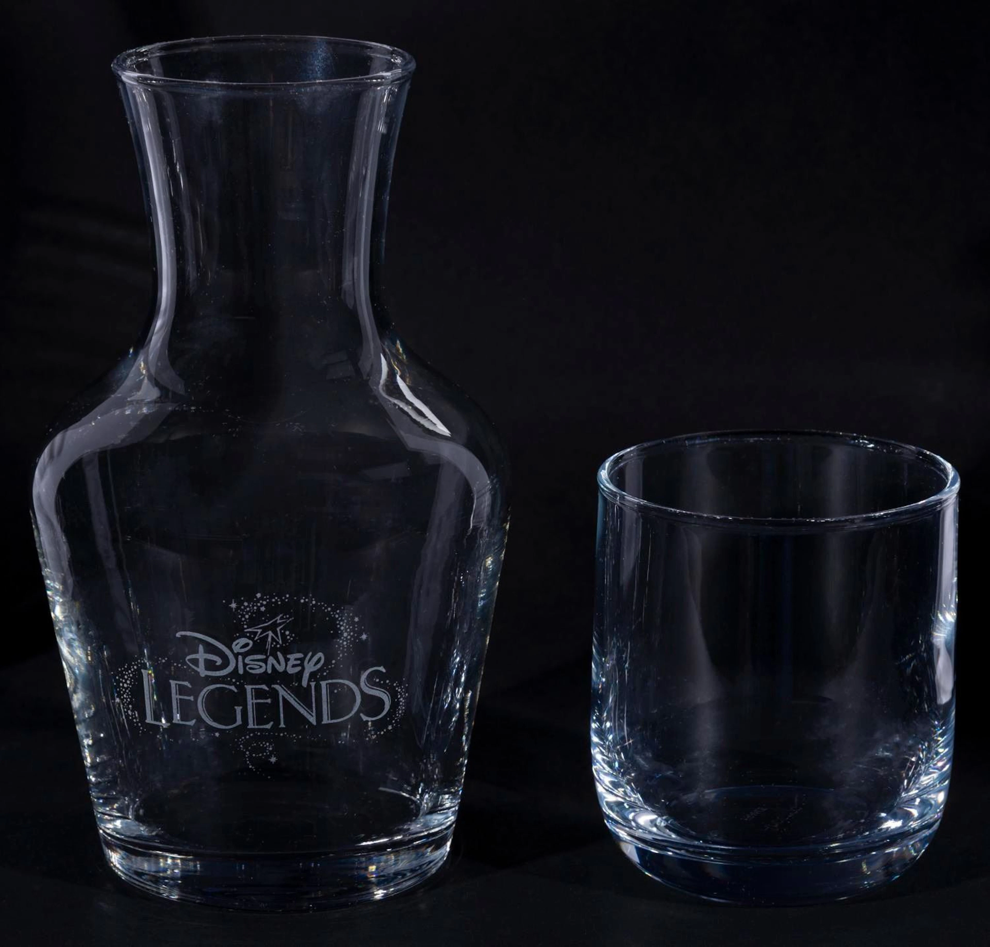 A Disney Legends Glass Carafe and Tumbler Set.