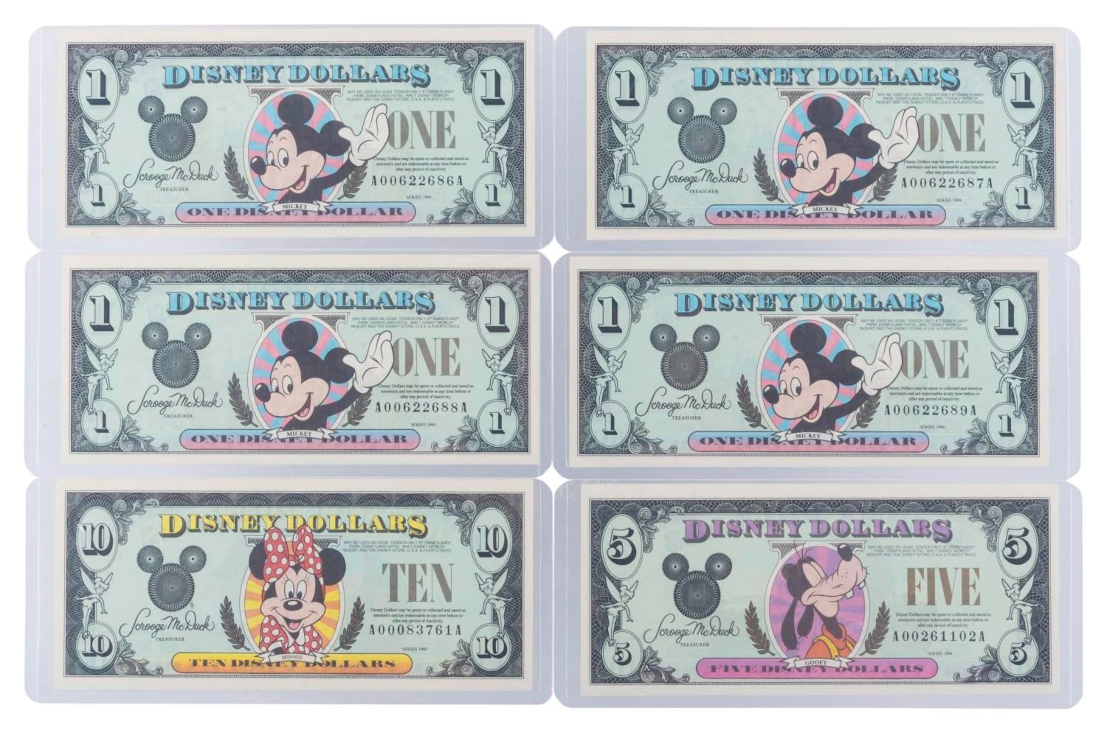 The Disneyland 1994 AA Series $1, $5, and $10 Bills.