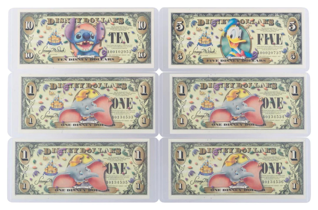 The Disneyland 2005 A First Series $1, $5, and $10 Bills.